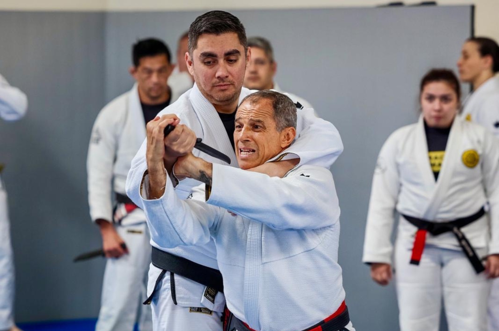 Martial arts instructor with kids