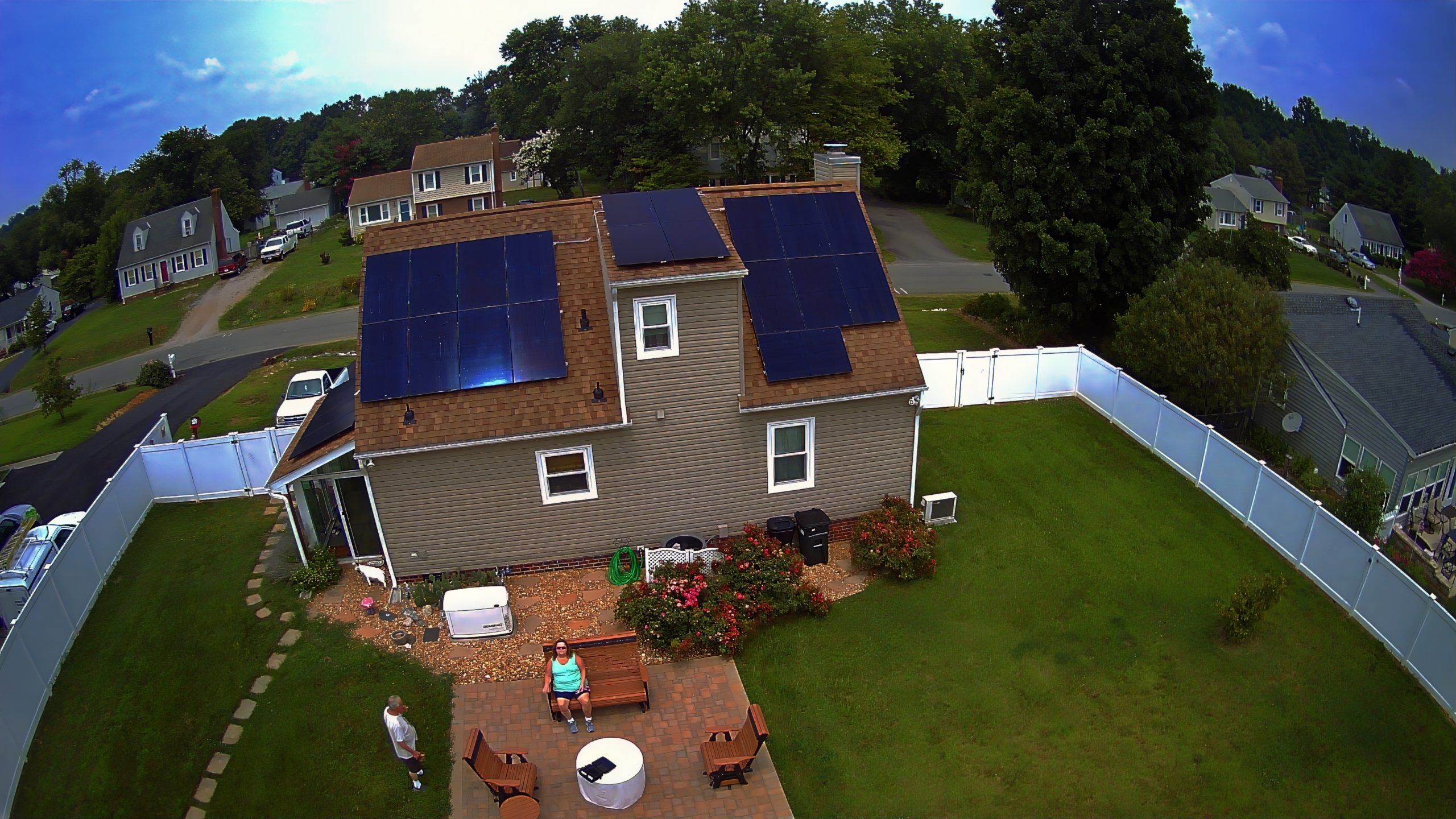 Solar installation on modern home with pool amenities