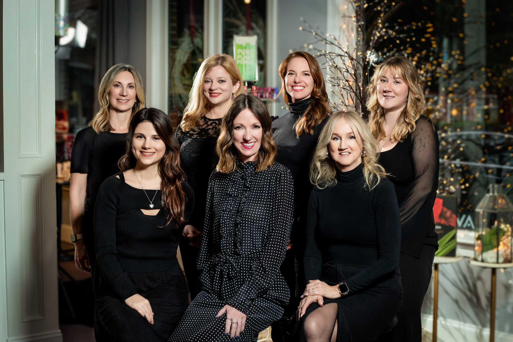 Corporate Headshot of a group of female employees and company founder