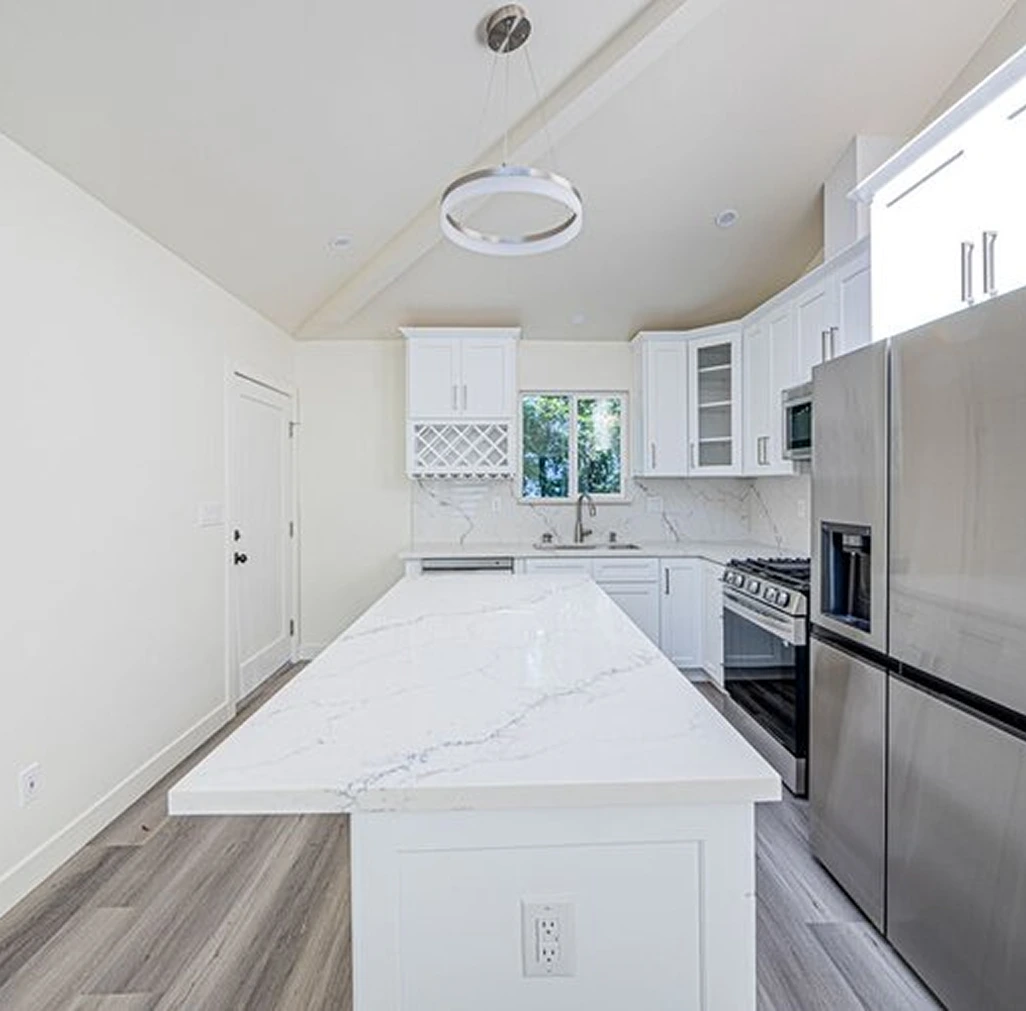 Elegant interior design with gold chandelier and red chair