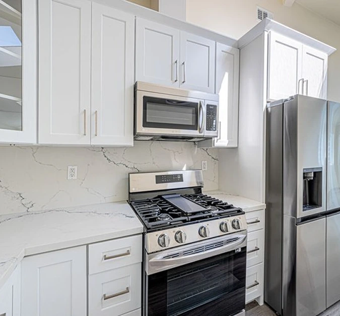 Elegant interior design with gold chandelier and red chair