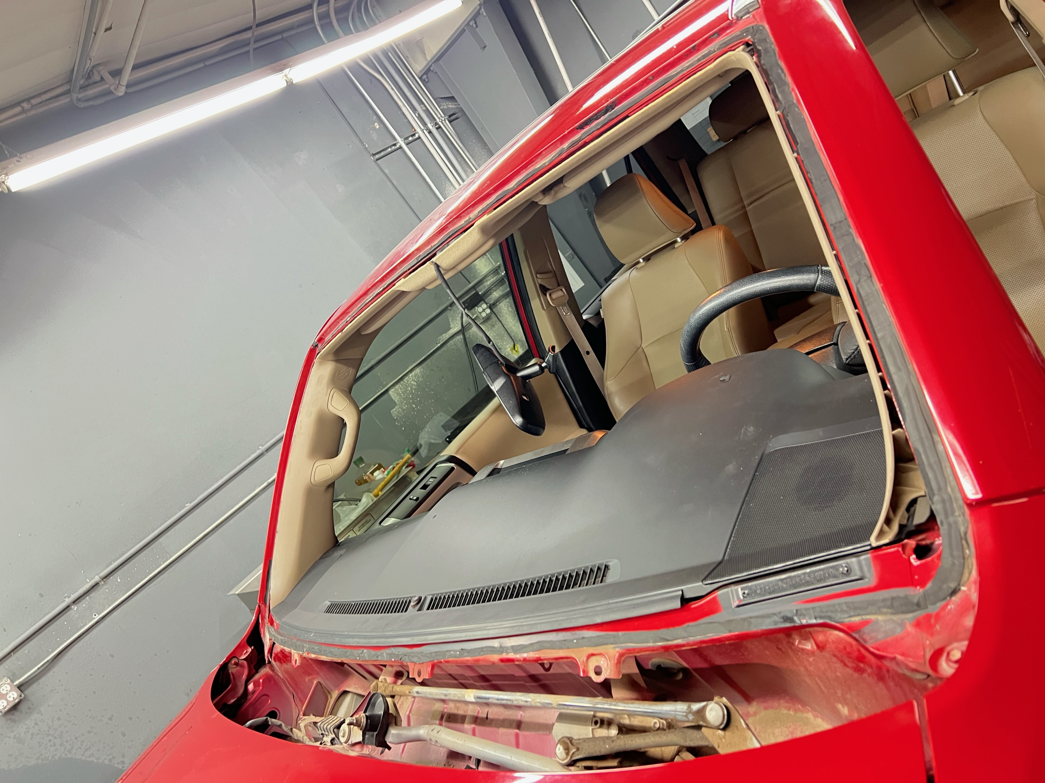"A Toyota 4Runner with a damaged windshield, showing visible chips and cracks. The image highlights the need for professional windshield repair or replacement to restore safety and visibility." "A Toyota 4Runner with a damaged windshield, showing visible chips and cracks. The image highlights the need for professional windshield repair or replacement to restore safety and visibility."