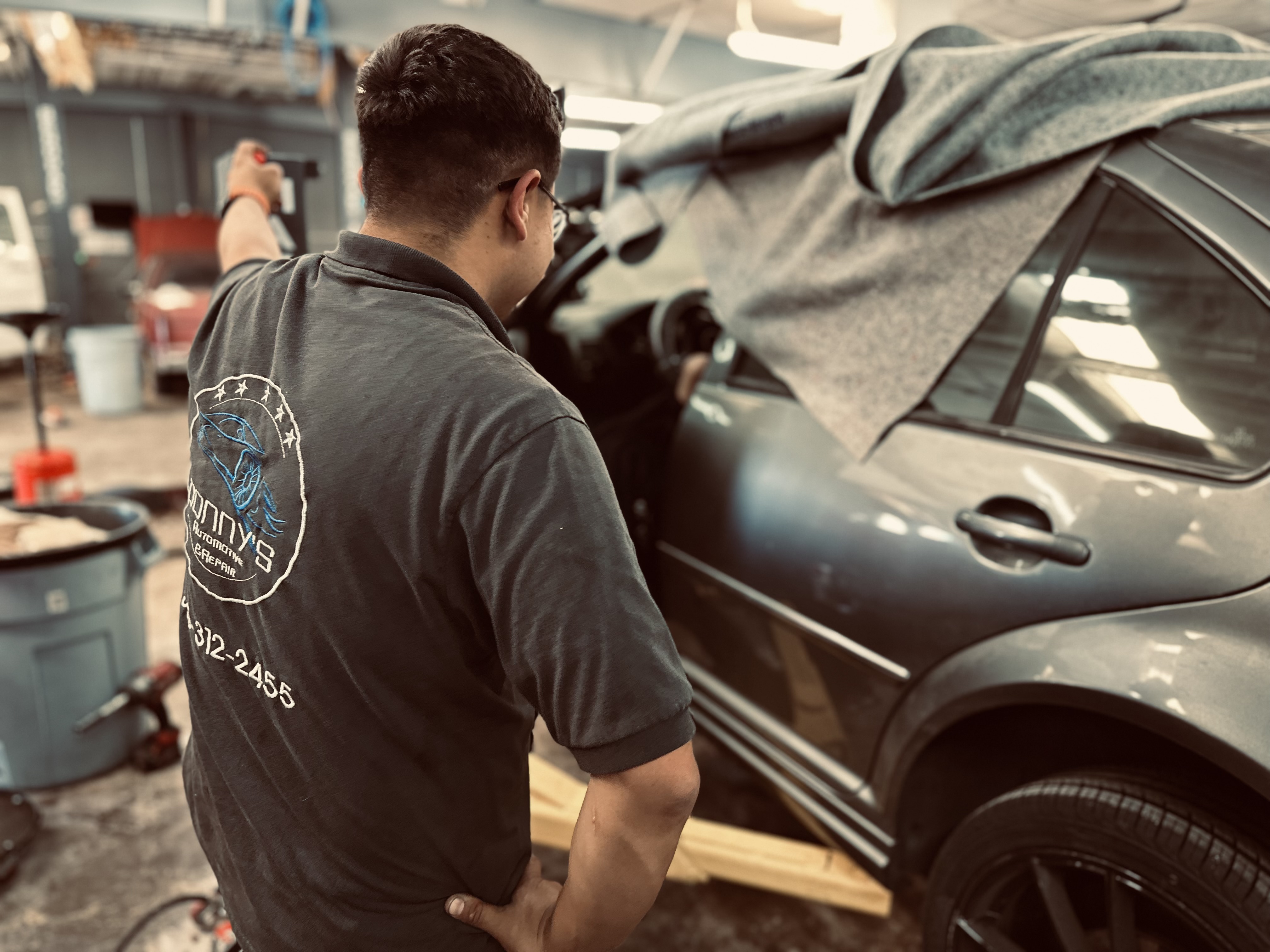ALT: "ASE-certified technician performing a diagnostic scan on a vehicle at Donny’s Automotive." ALT: "ASE-certified technician performing a diagnostic scan on a vehicle at Donny’s Automotive."