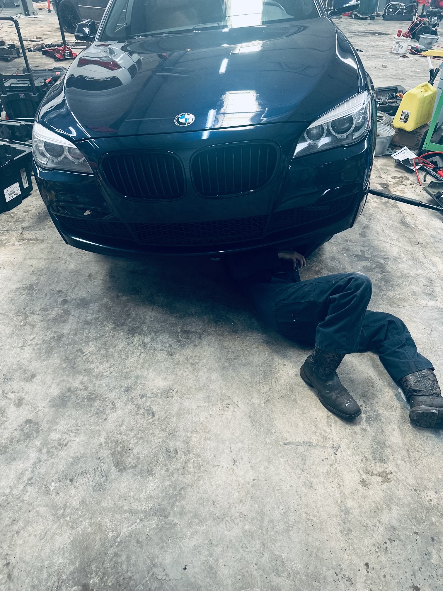 Mechanic in company uniform at Donny’s Automotive measuring tire tread and checking tire pressure on a customer’s vehicle, emphasizing the importance of tire safety for summer driving. Mechanic in company uniform at Donny’s Automotive measuring tire tread and checking tire pressure on a customer’s vehicle, emphasizing the importance of tire safety for summer driving.