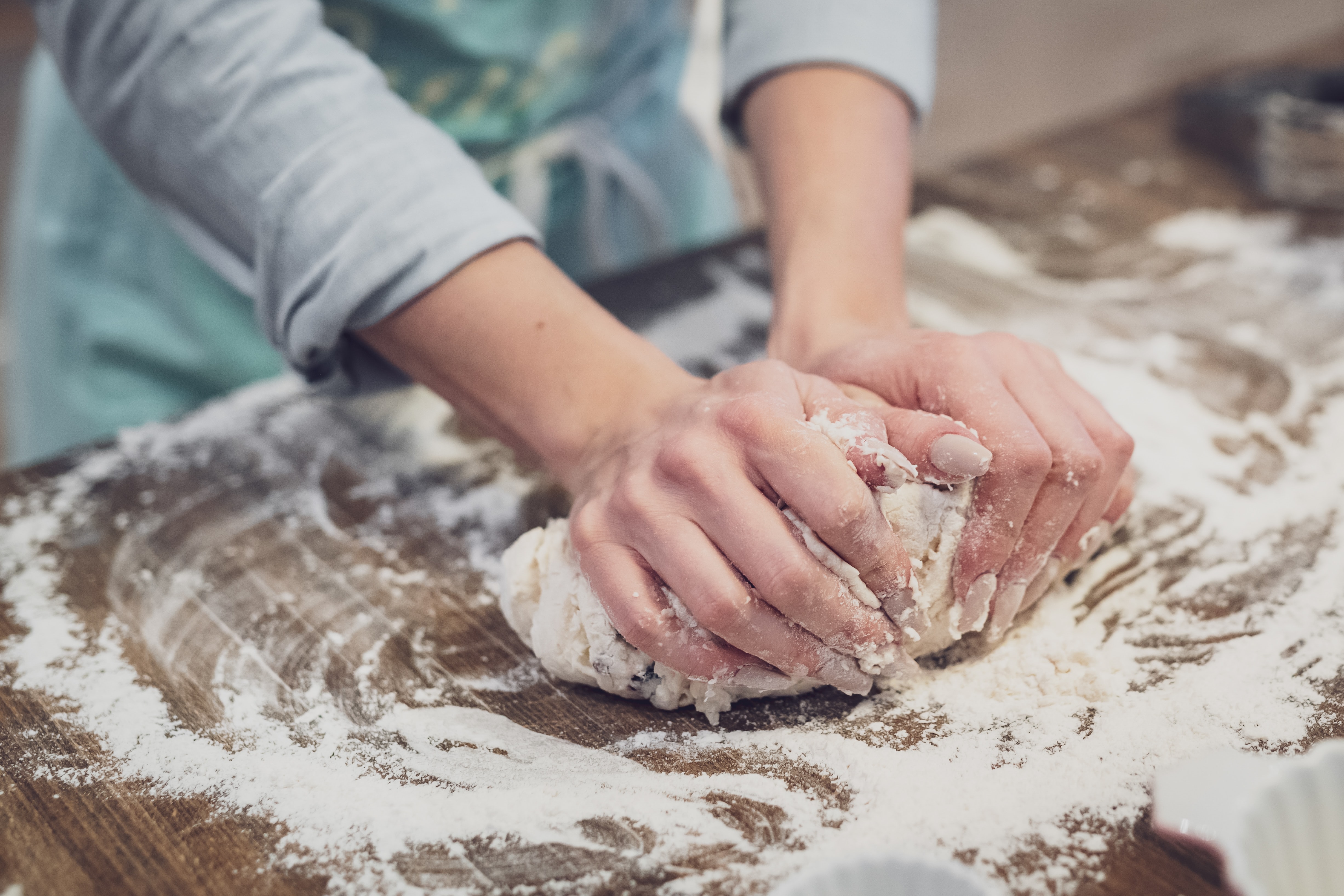 Baker kneading dough