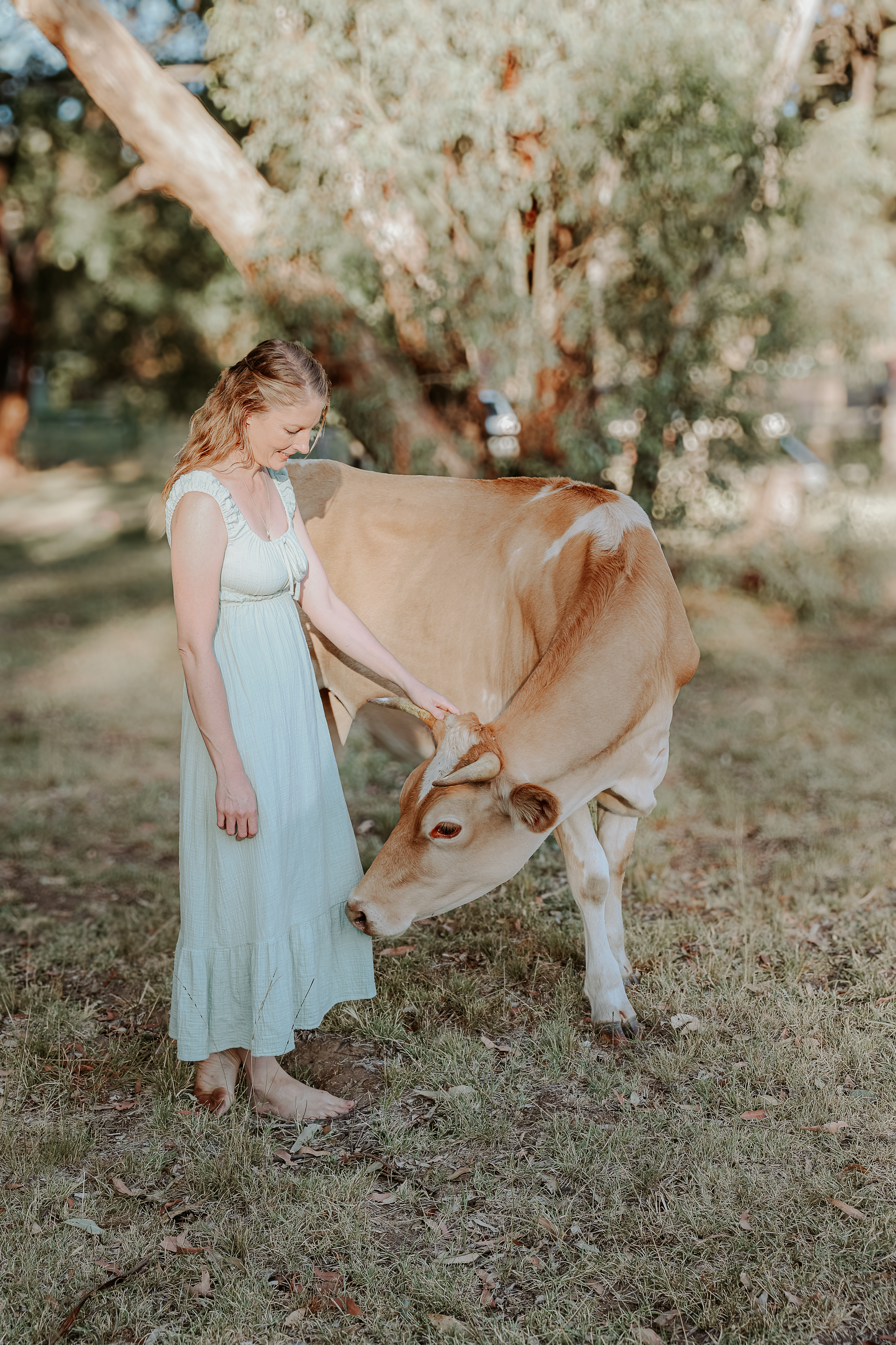 Zoe with her cow showing she can do things on a smaller scale and be imperfect and thrive Zoe with her cow showing she can do things on a smaller scale and be imperfect and thrive