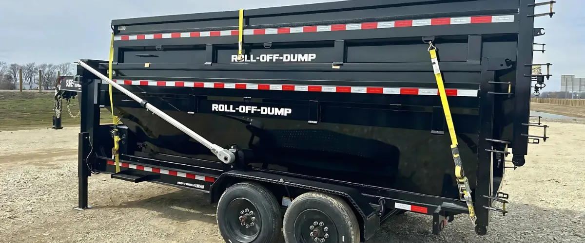Heavy-duty roll-off dumpster securely fastened on a trailer, ready for transport to a Lizton home cleanup site. Heavy-duty roll-off dumpster securely fastened on a trailer, ready for transport to a Lizton home cleanup site.