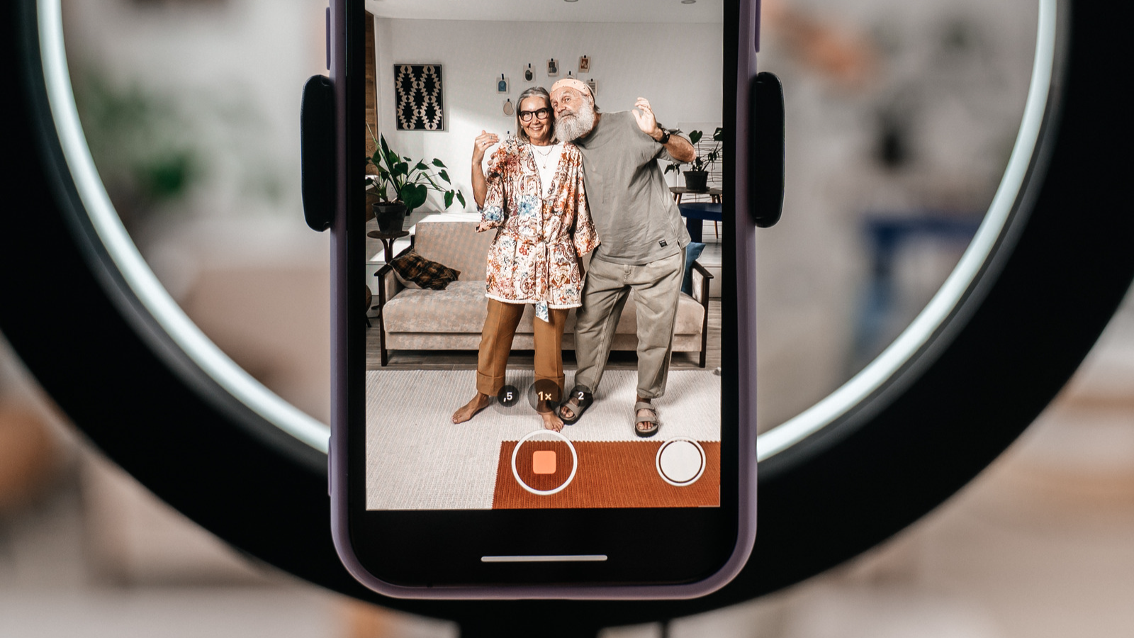 couple taking a selfie with ring light