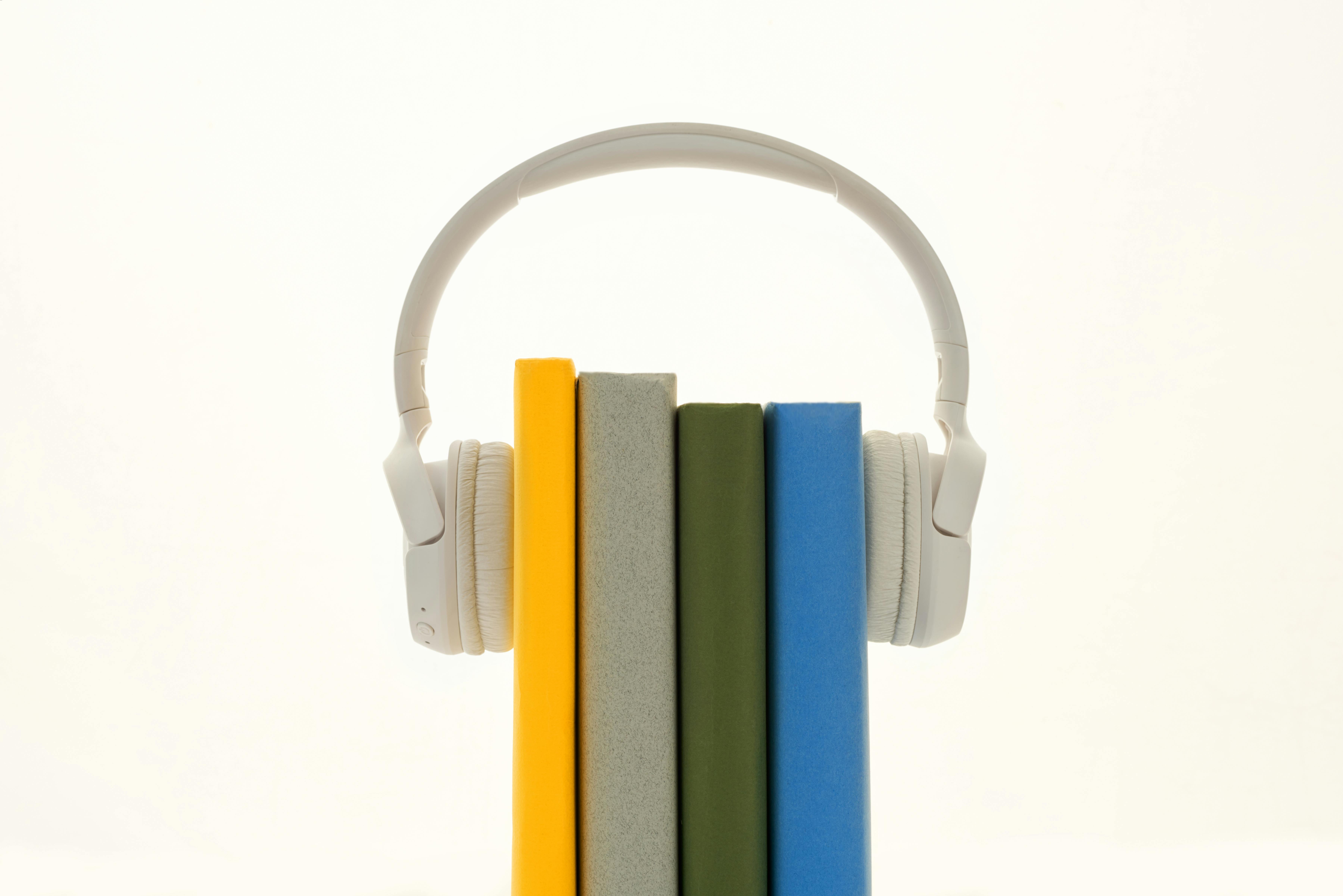 book with headphones to signify listening to words phonemes reading book with headphones to signify listening to words phonemes reading