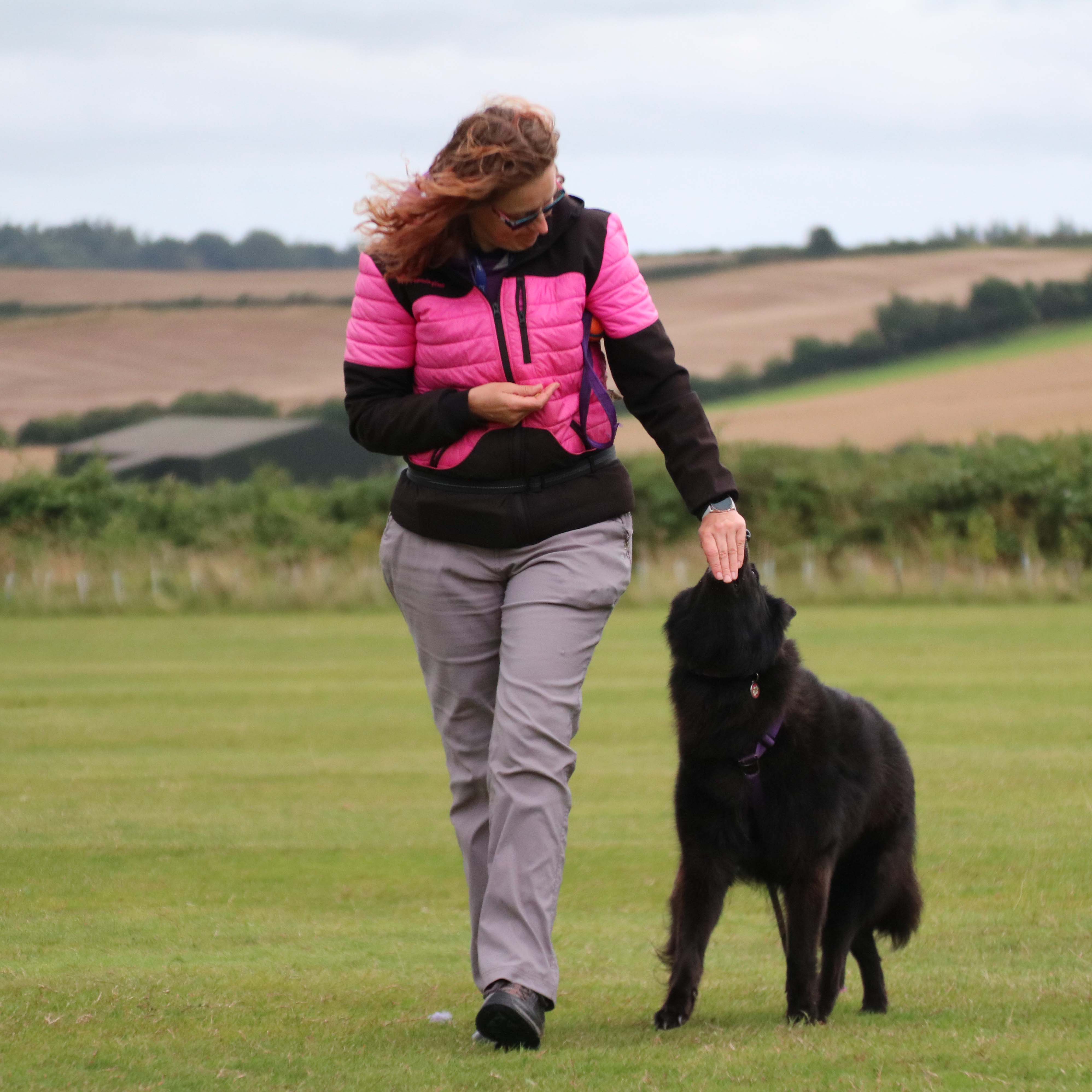 Natasja training Obedience with her BSD Groenendael Cassie
