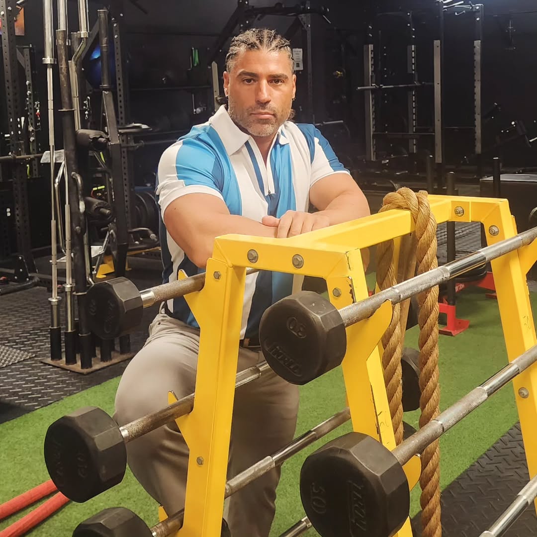 Members doing high-intensity conditioning work on the turf at SHED Fitness