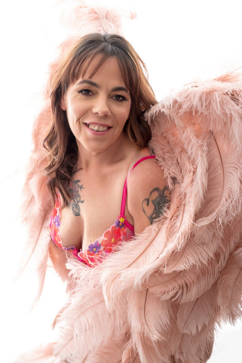 Image from Amber's boudoir photoshoot with angel wings by Cory Powell Photography