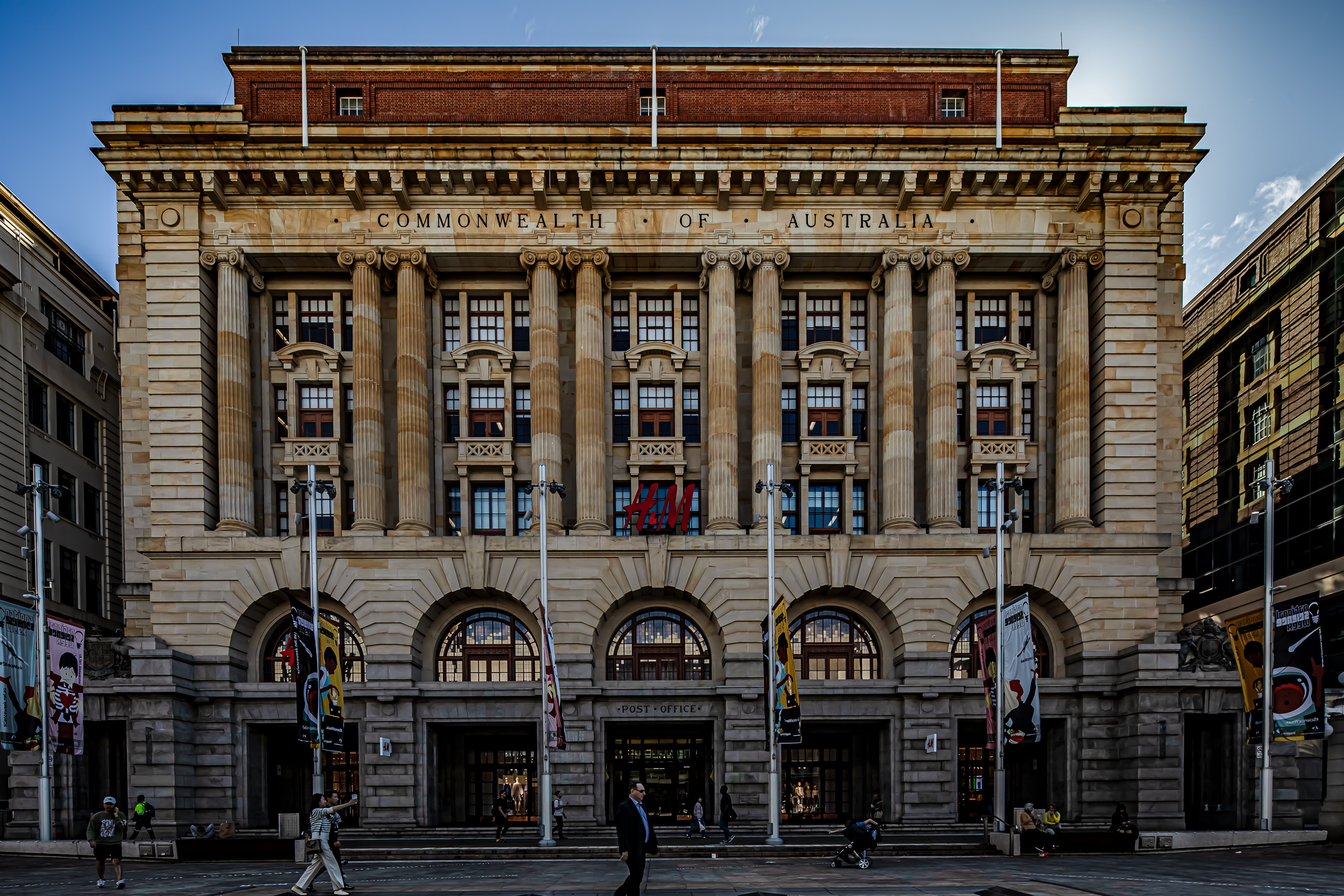 Historic Commonwealth Bank building in Perth CBD with grand columns and sandstone facade