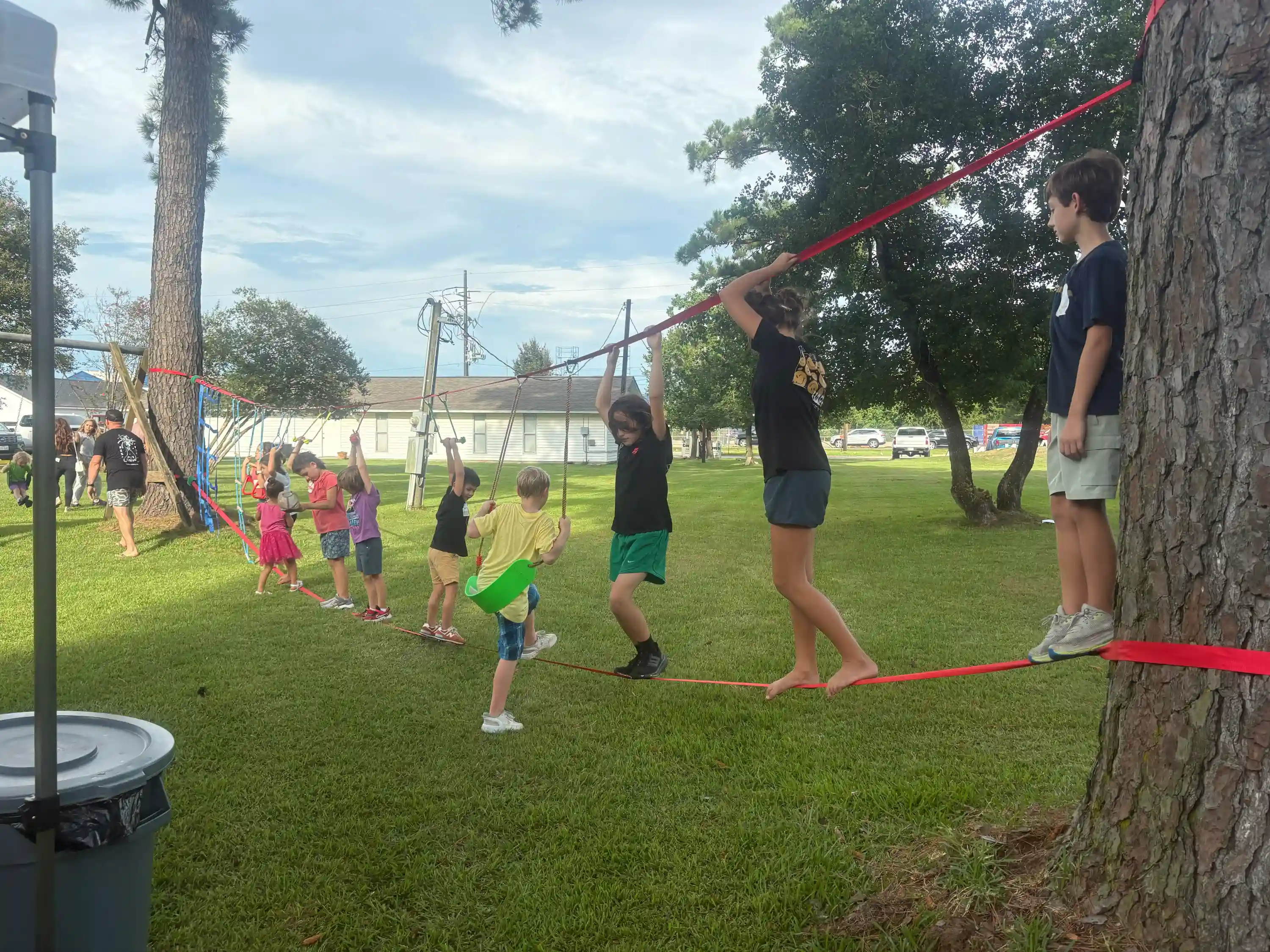 group of students playing on playground equipment