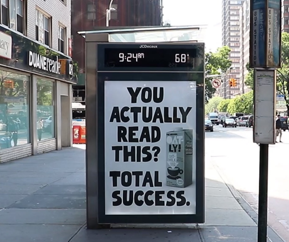 Oatly ad bus station
