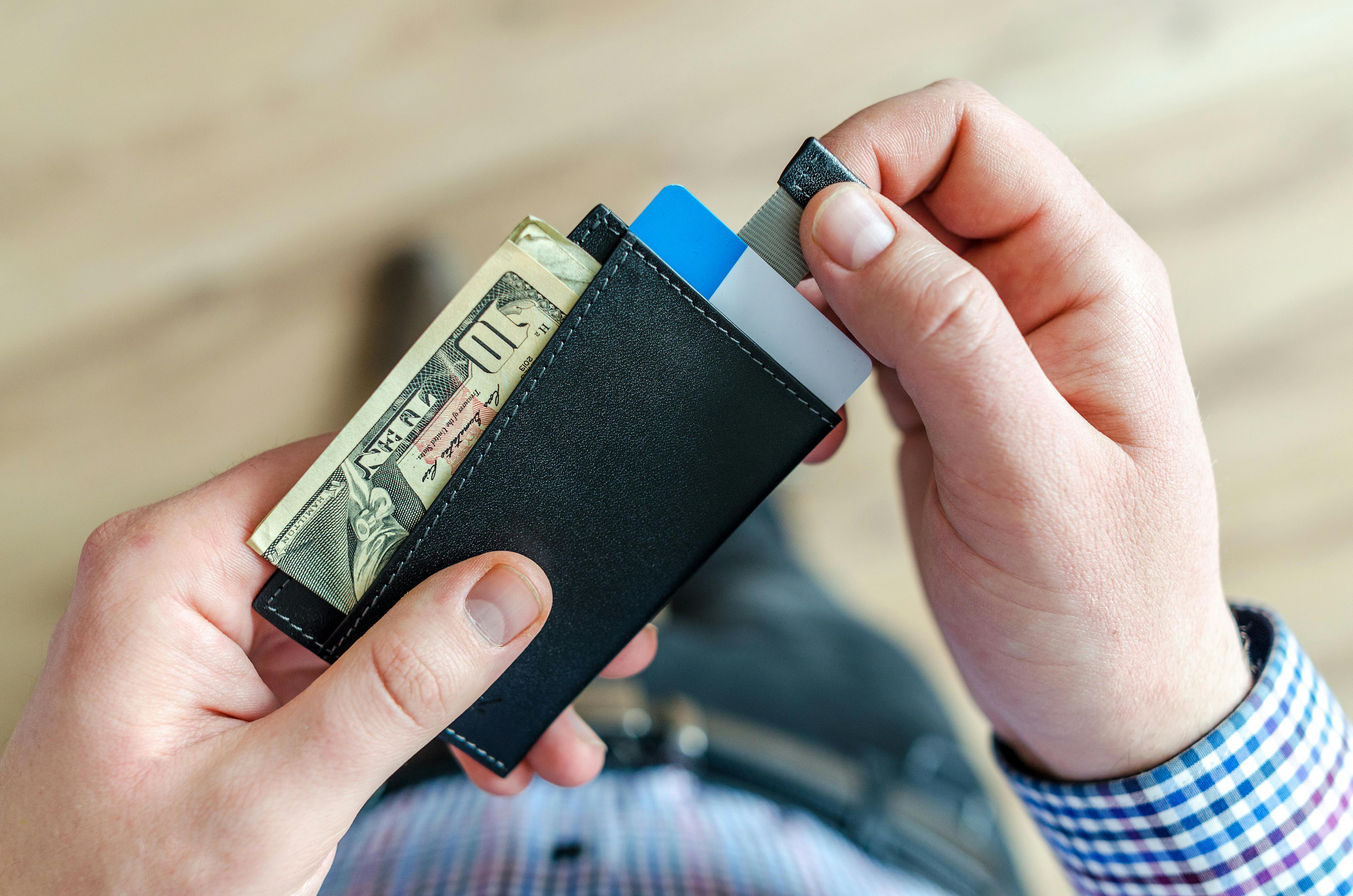 man holding wallet