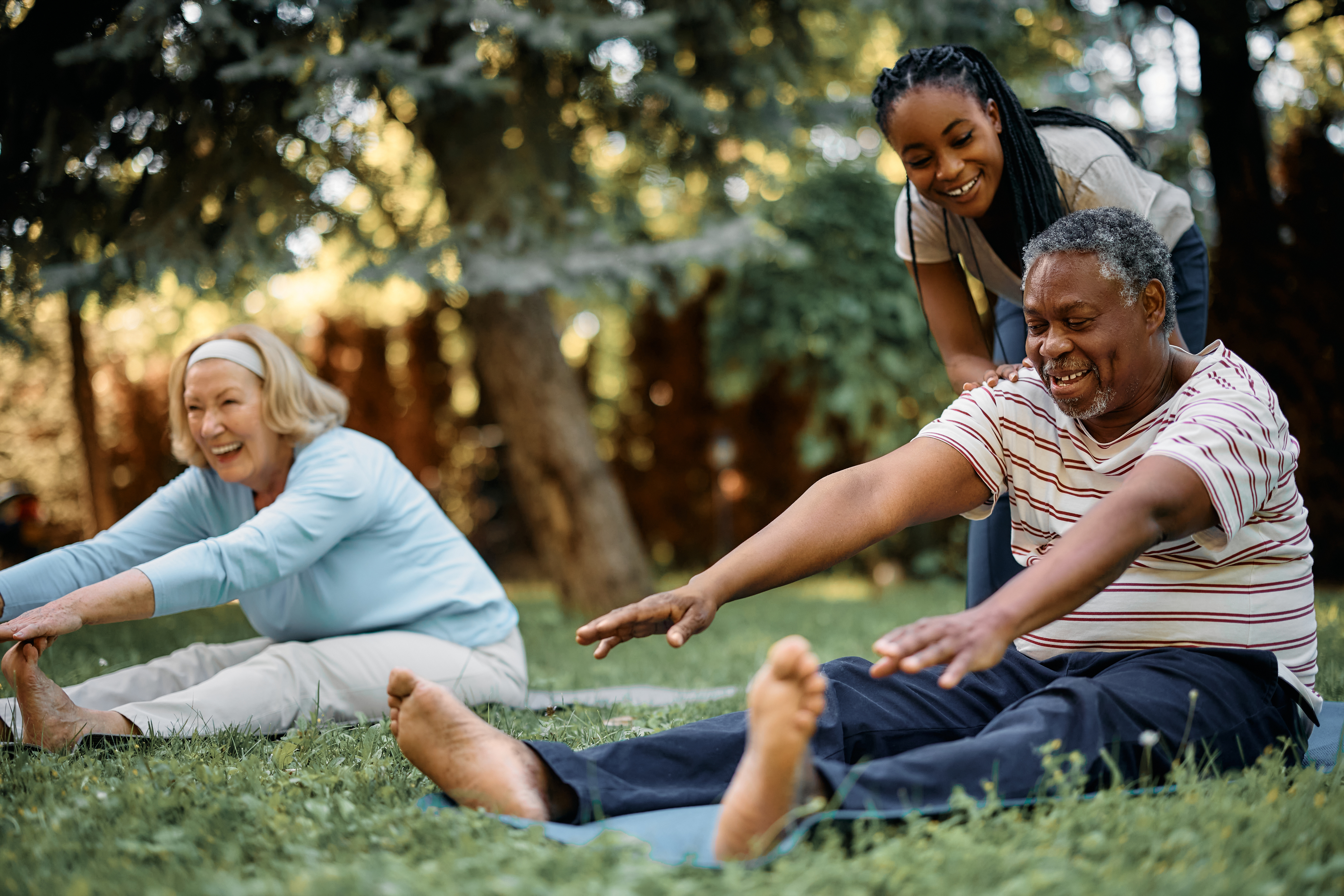 A serene private yoga session with a man practicing outdoors