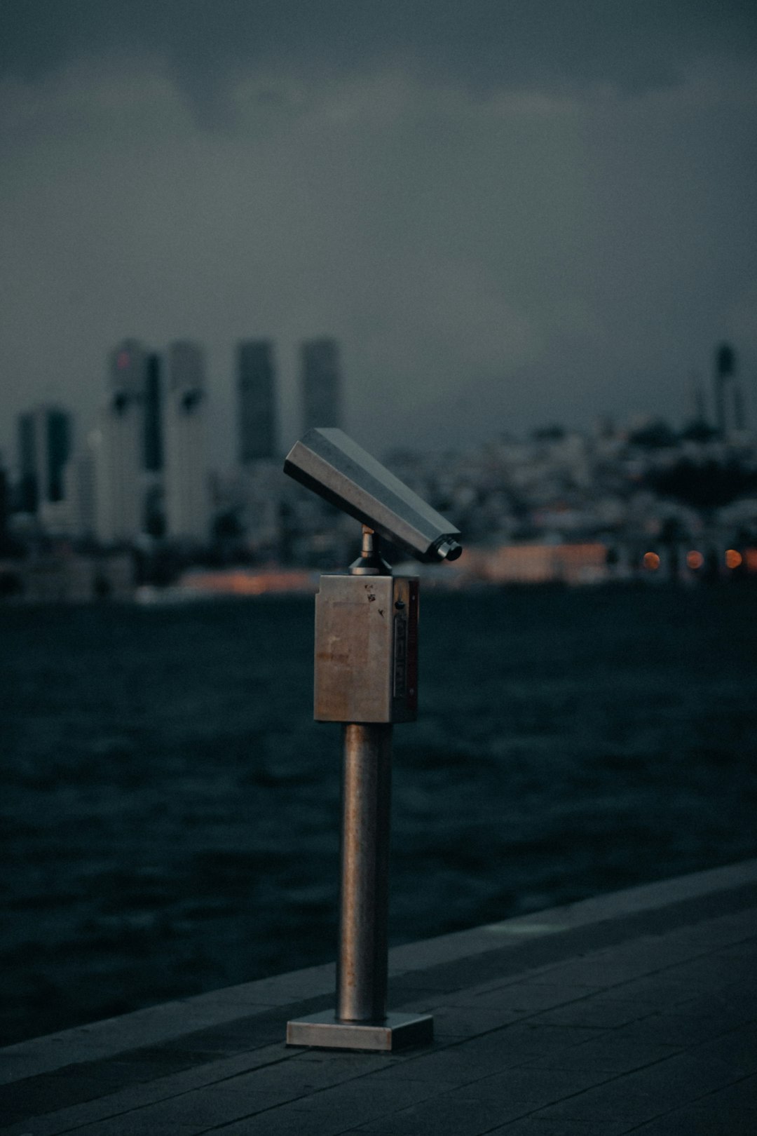 Telescope in front of city. Telescope in front of city.