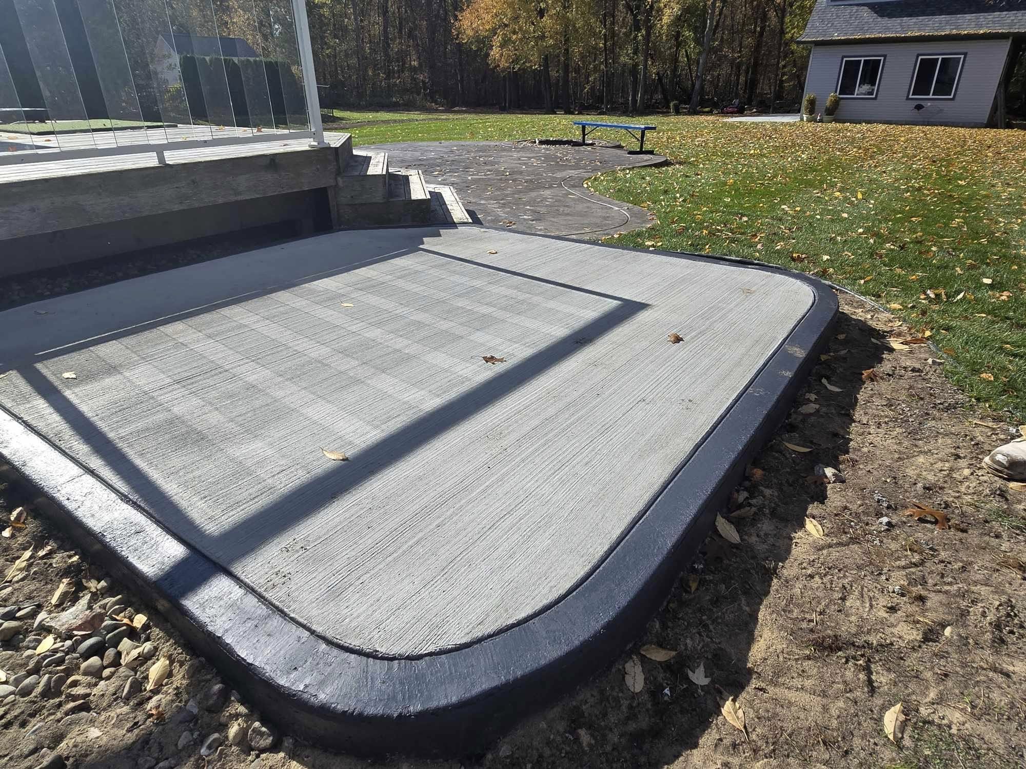 Freshly stained and sealed concrete