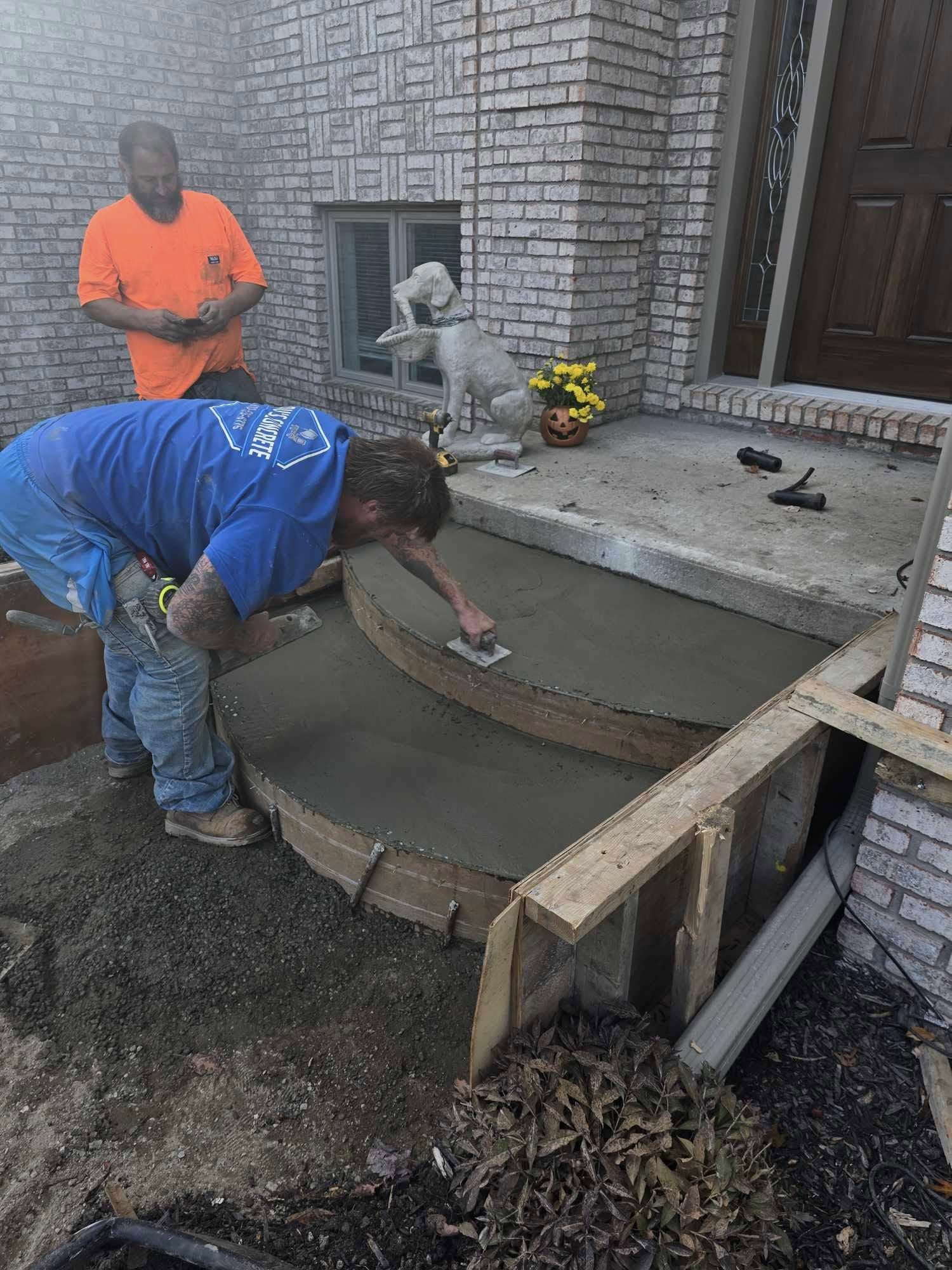 John and his crew hard at work creating custom concrete stairs