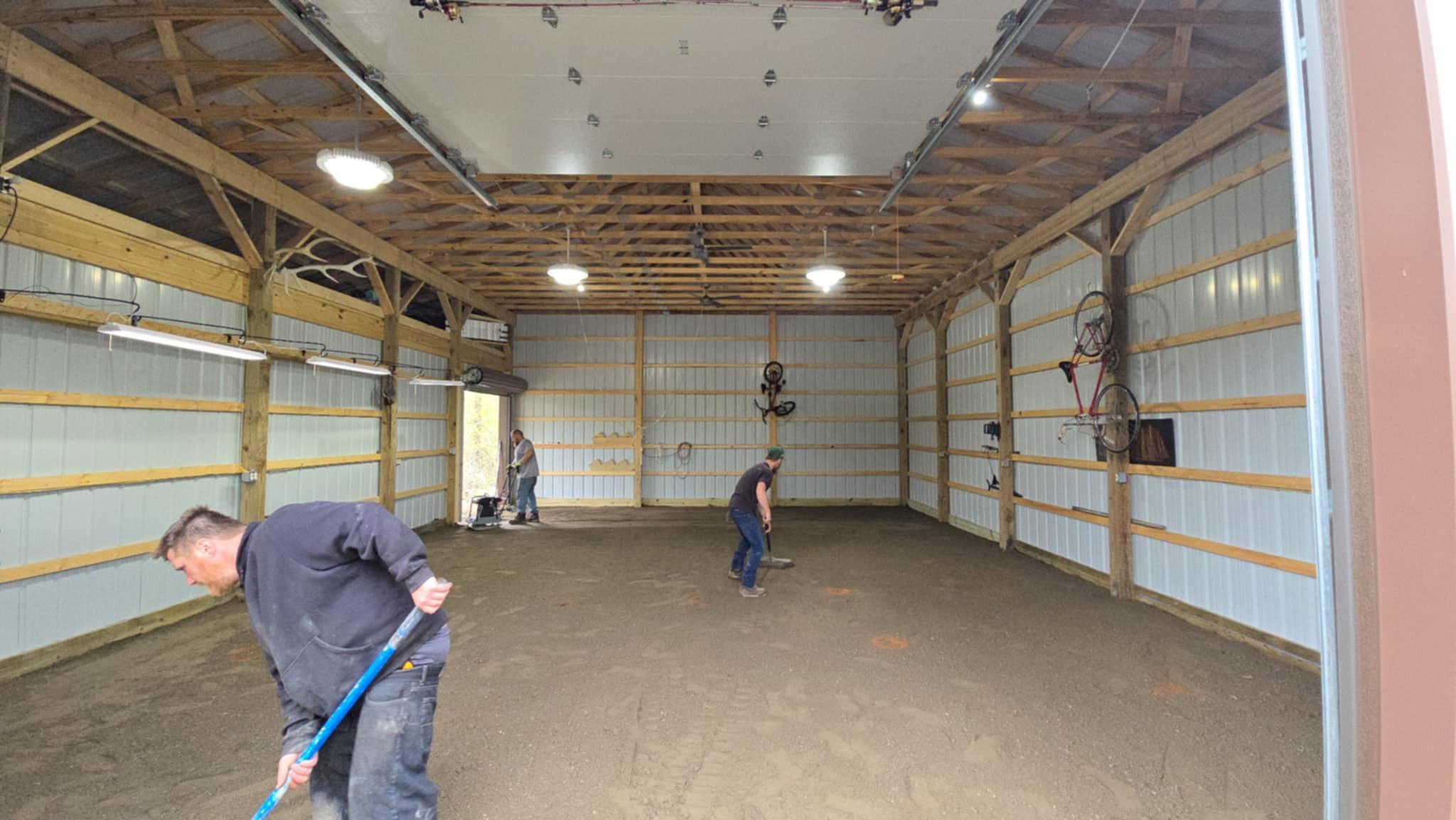 The process of flooring for a pole barn continued