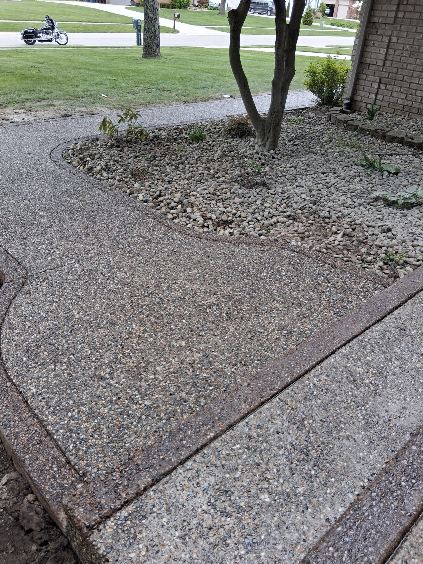 A wonderfully done concrete step/patio job, first angle