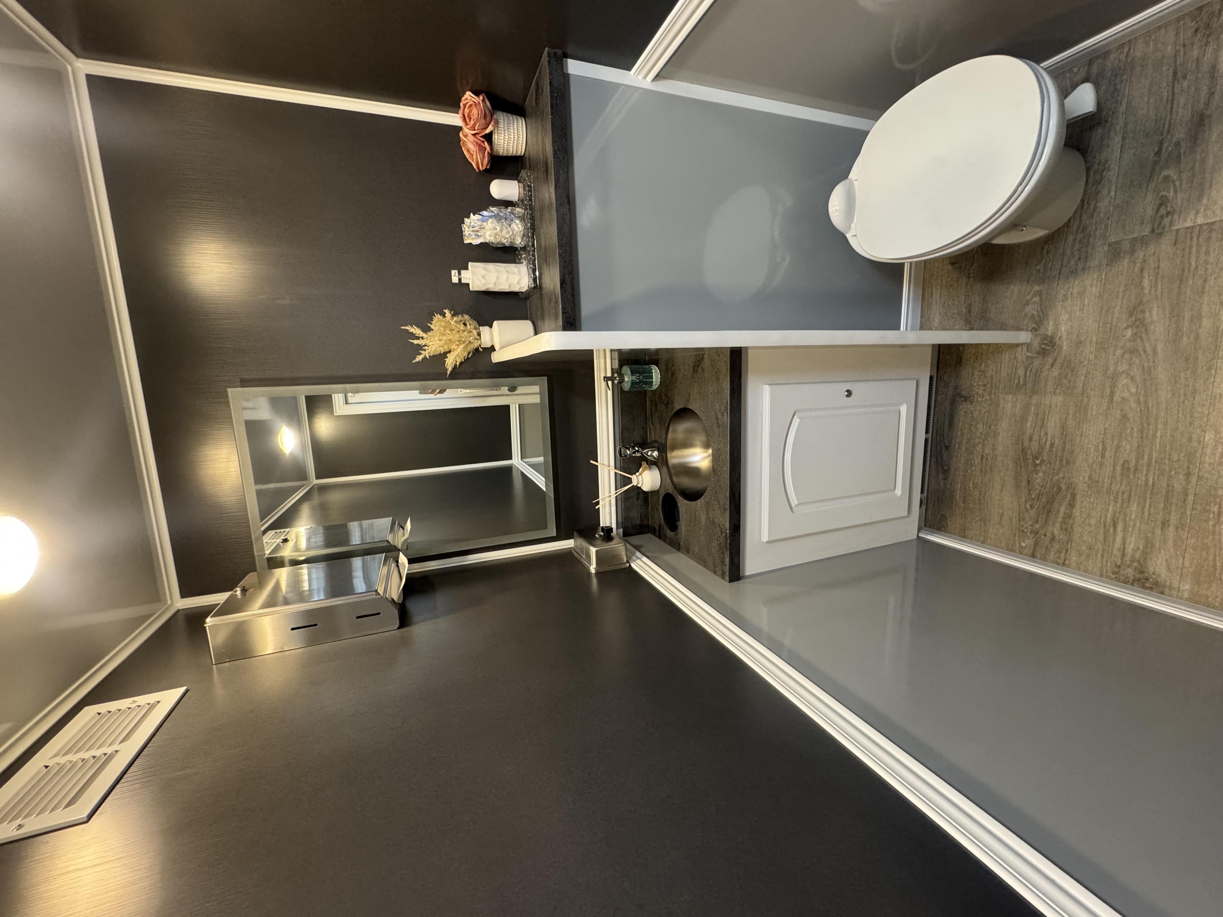 luxury restroom trailer sink mirror and lighting North Bay