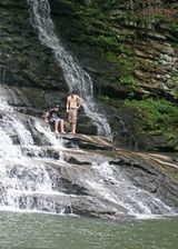 My sons standing on the rocks by one of the many waterfalls.