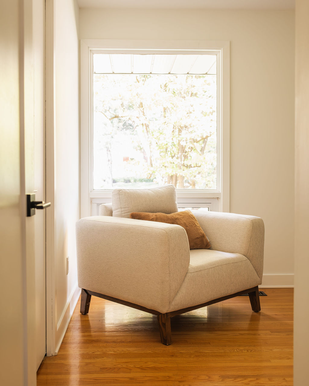 Bright freshly painted room in Ottawa home with natural light and crisp white trim