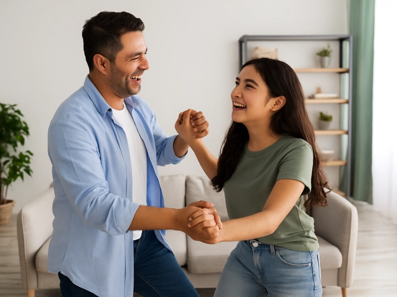Father and daughter with Latino features practicing quinceañera dance steps in their living room Father and daughter with Latino features practicing quinceañera dance steps in their living room