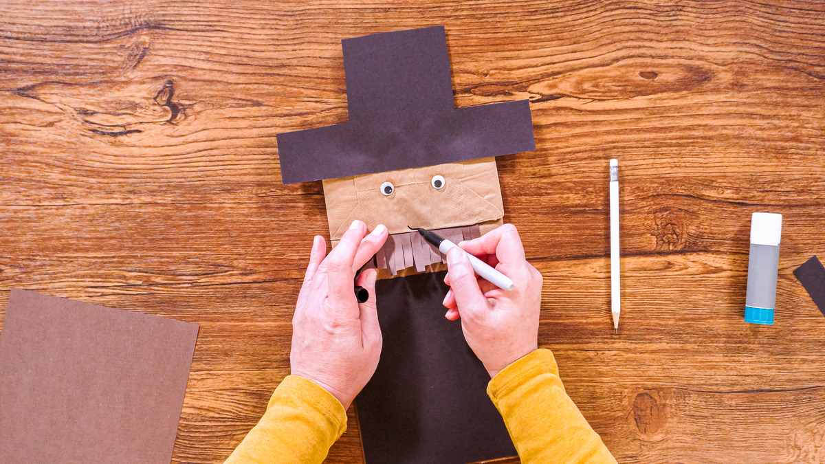 making paper bag puppet summer craft