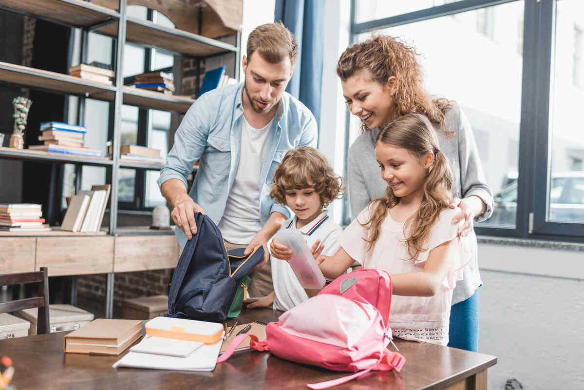 parents-packing-kids-for-their-first-day-at-preschool