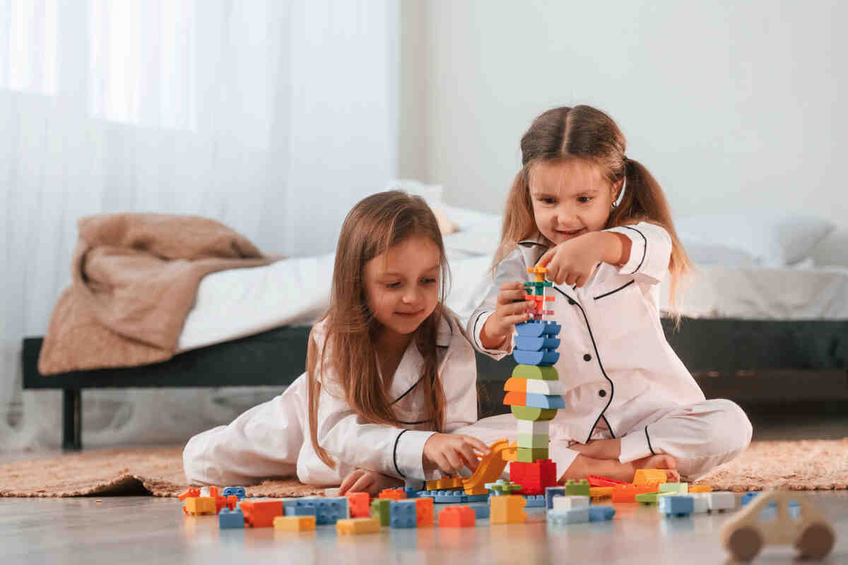 two-little-girls-are-playing-and-having-fun-when-parents-balance-their-worklife