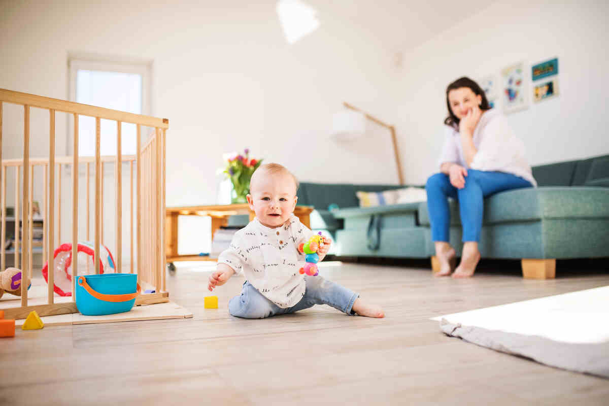 a-baby-boy-playing-on-the-floor-at-home-mother-infant-care