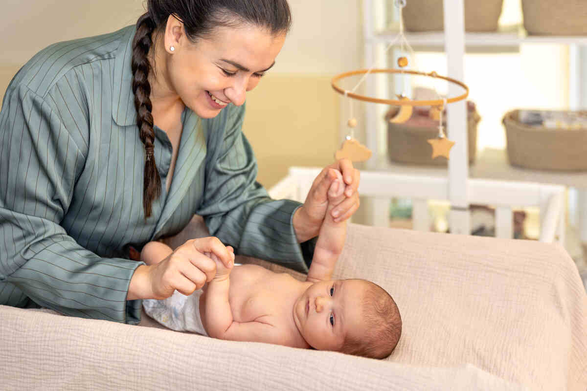 a-young-mother-with-a-newborn-baby-newborn-baby-infant-care-guide