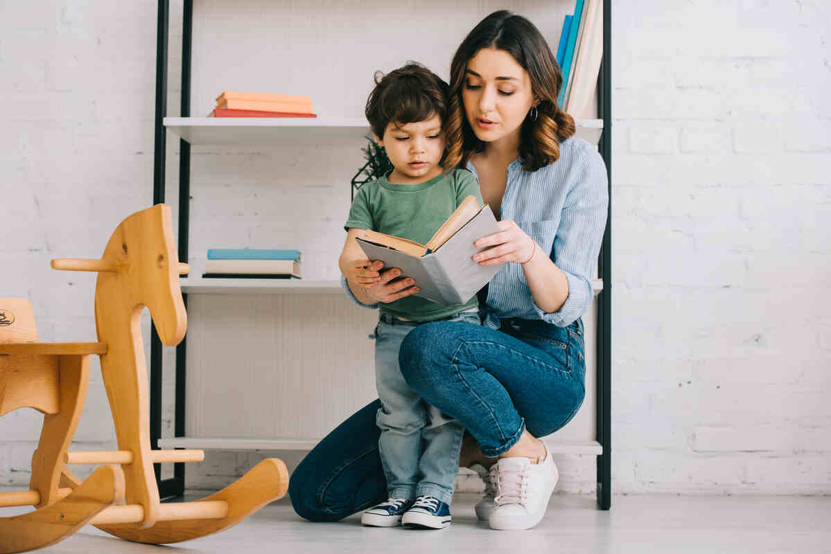 mother-and-child-reading-parenting-guide-book-