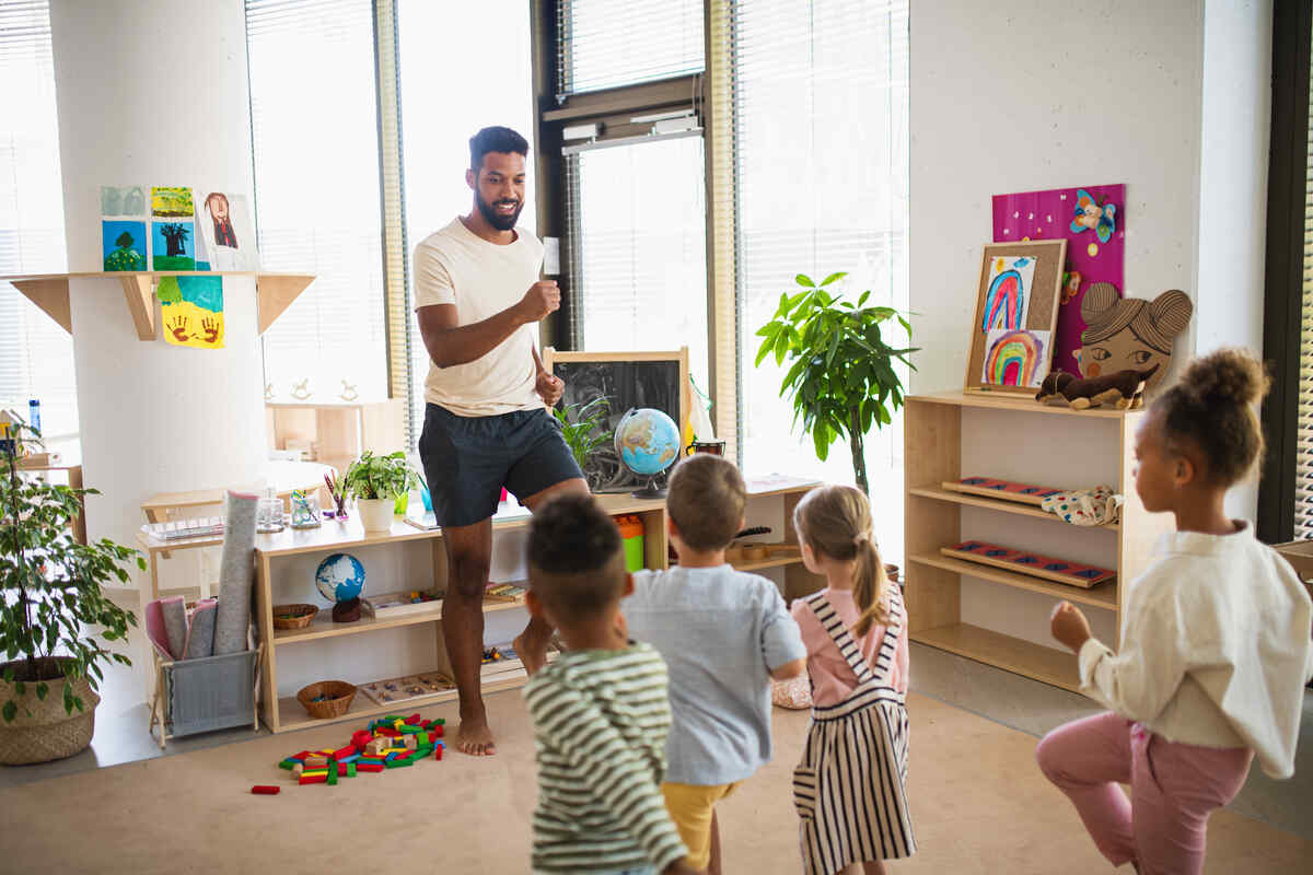 nursery-school-children-with-man-teacher-kindergarten-curriculum
