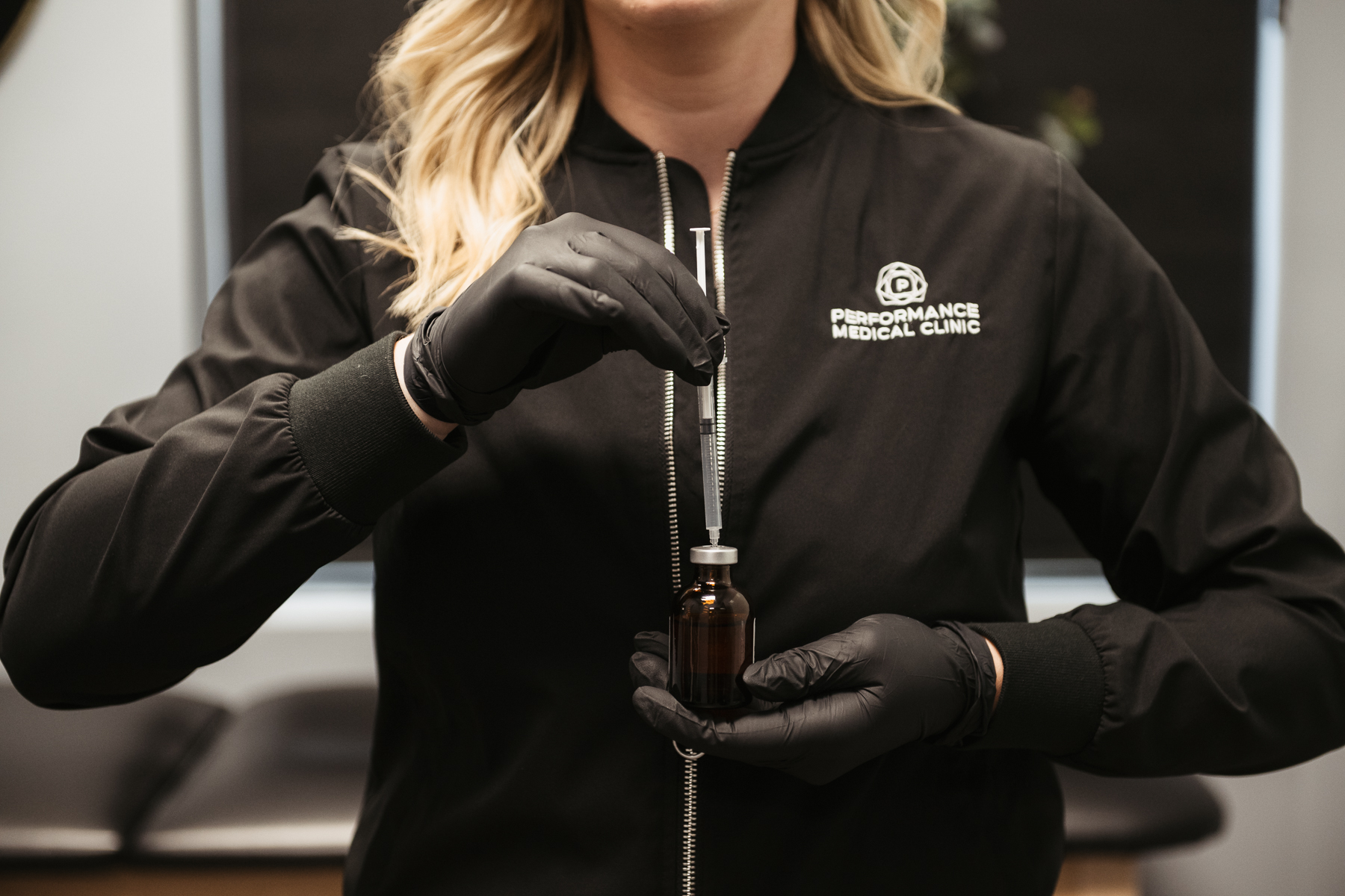 A VIAL WITH A NEEDLE
