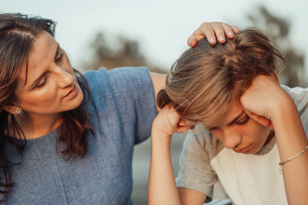 mom with frustrated son mom with frustrated son