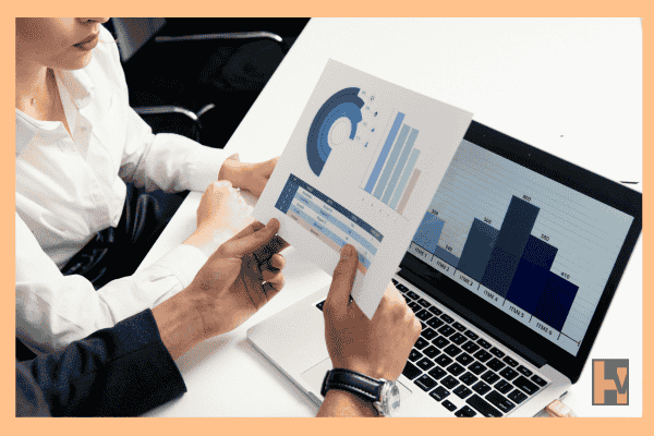 women holding graph women holding graph