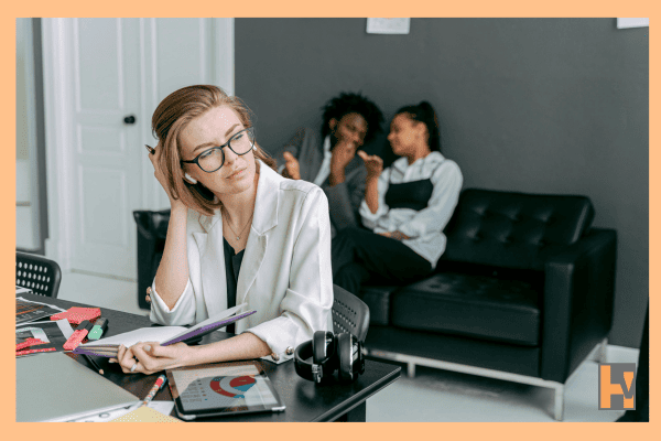 woman looking thoughtful with paperwork woman looking thoughtful with paperwork
