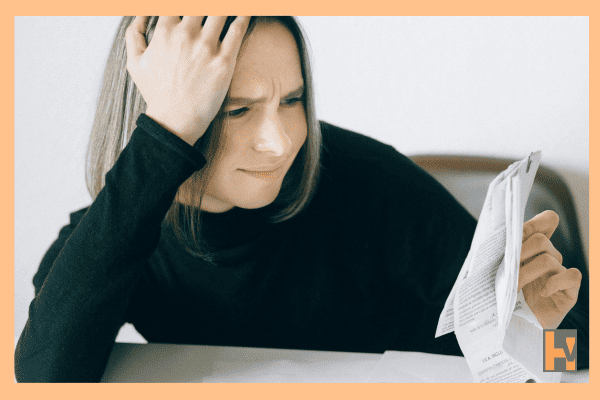 stressed women reviewing bills stressed women reviewing bills