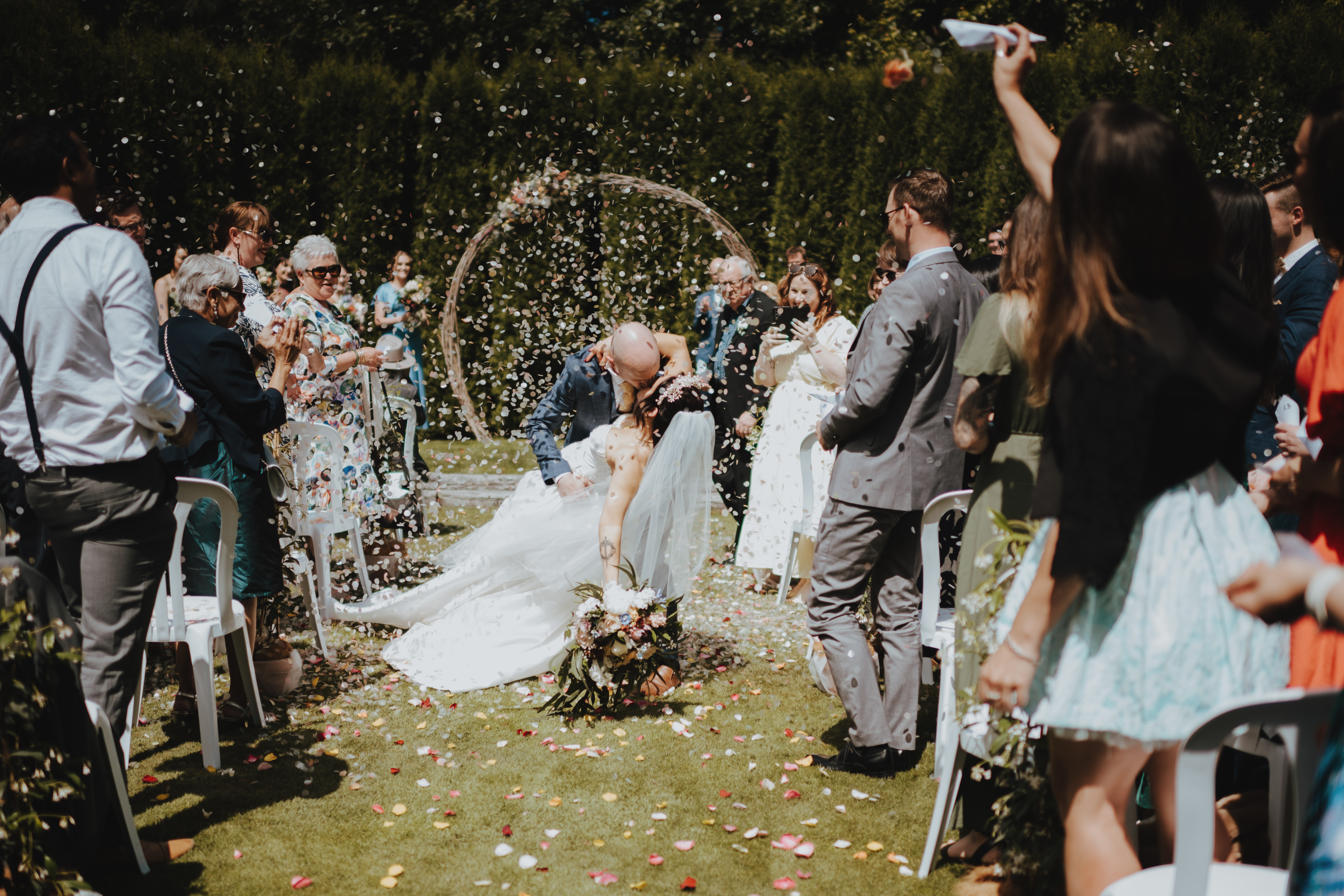 newlyweds stopping for second kiss when exiting the ceremony