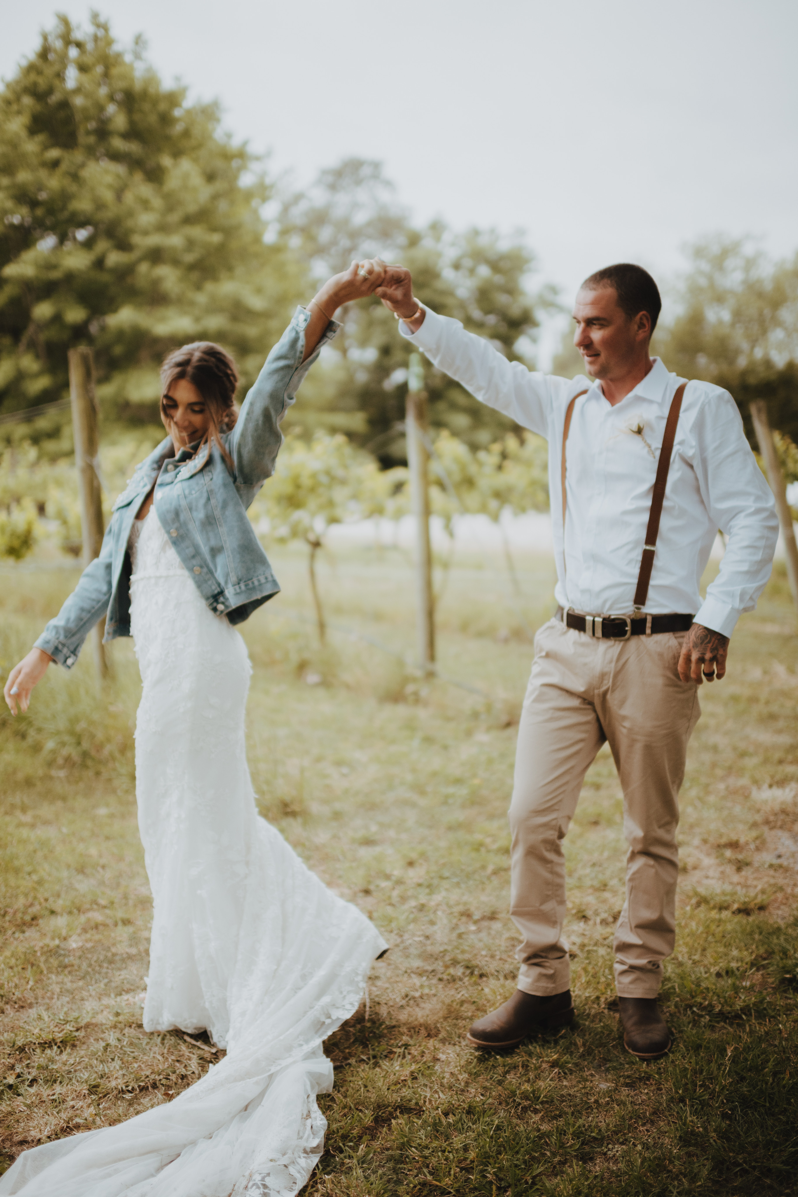 bride and groom together dancing for newlywed photos
