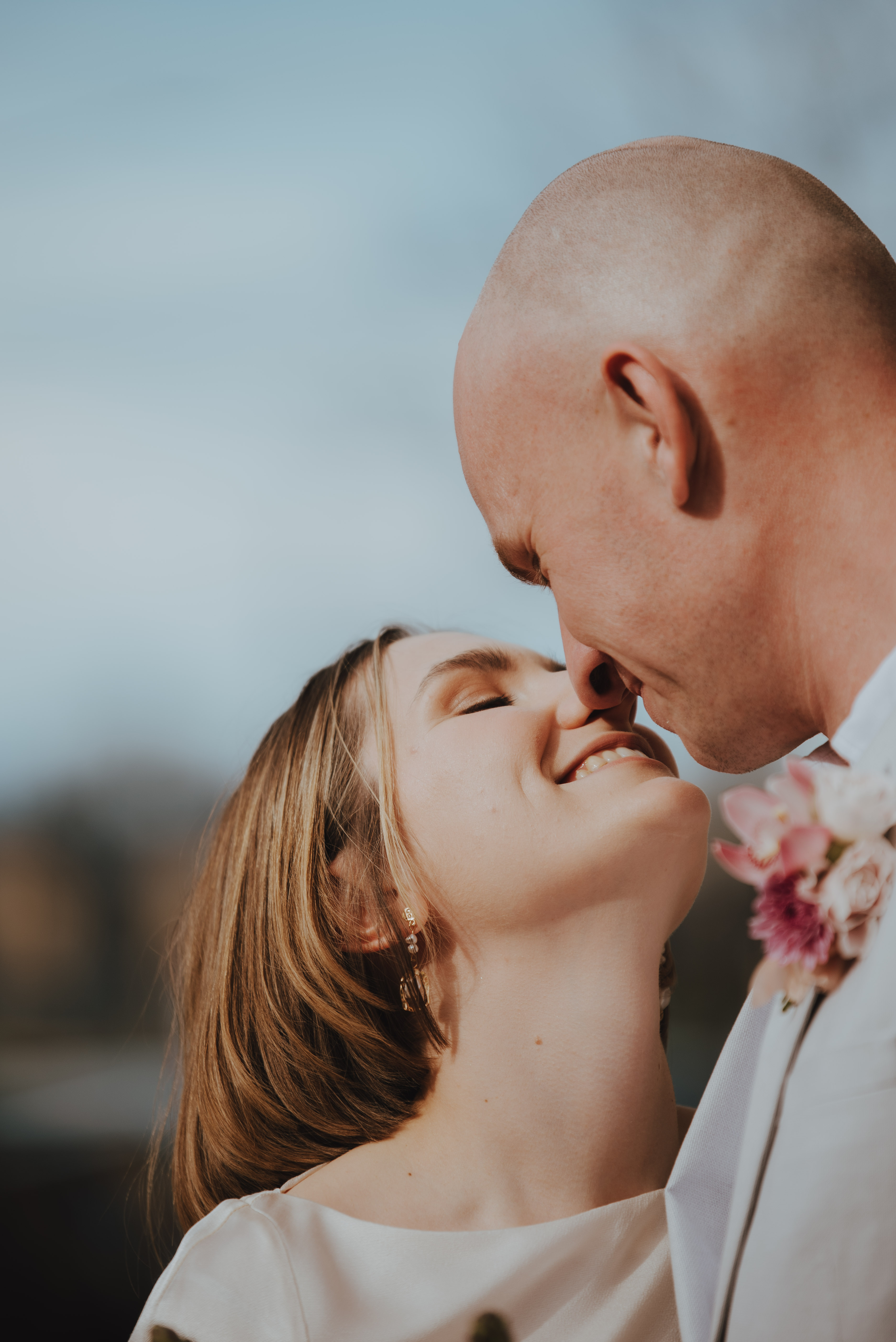 couple laughing, looking into eachothers eyes