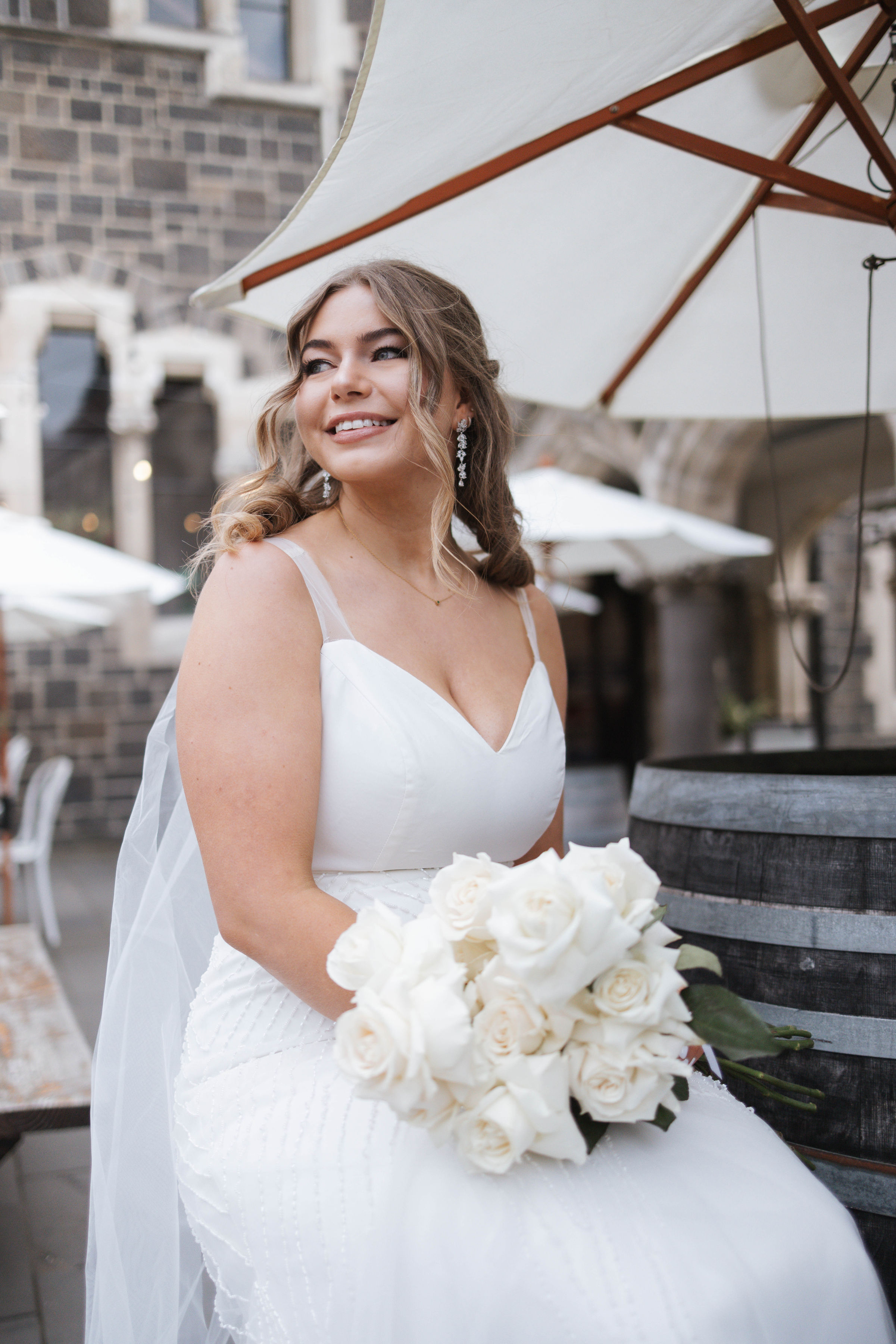 model smiling in the arts centre for bridal photoshoot