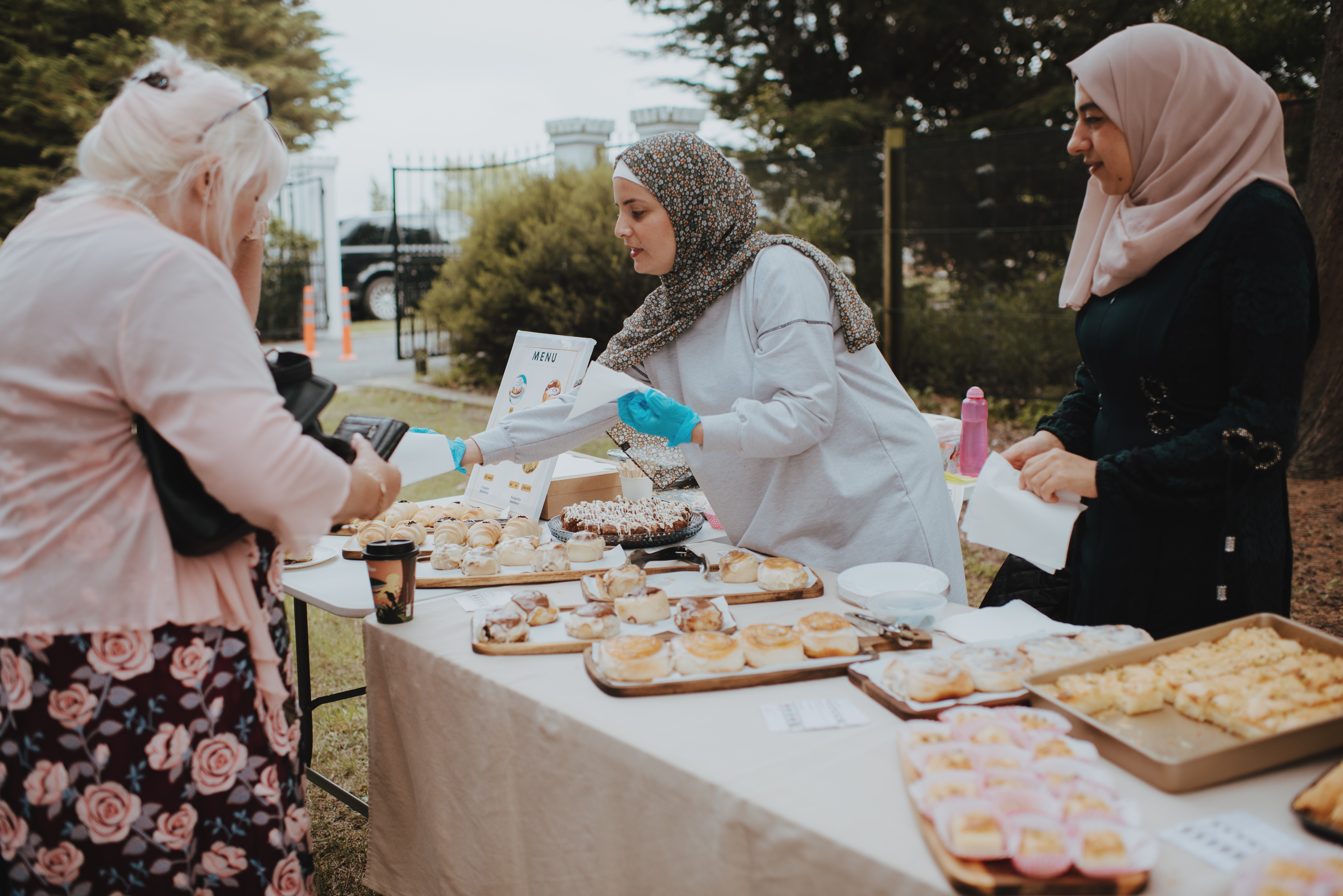 vendors selling cakes and delicious pastries