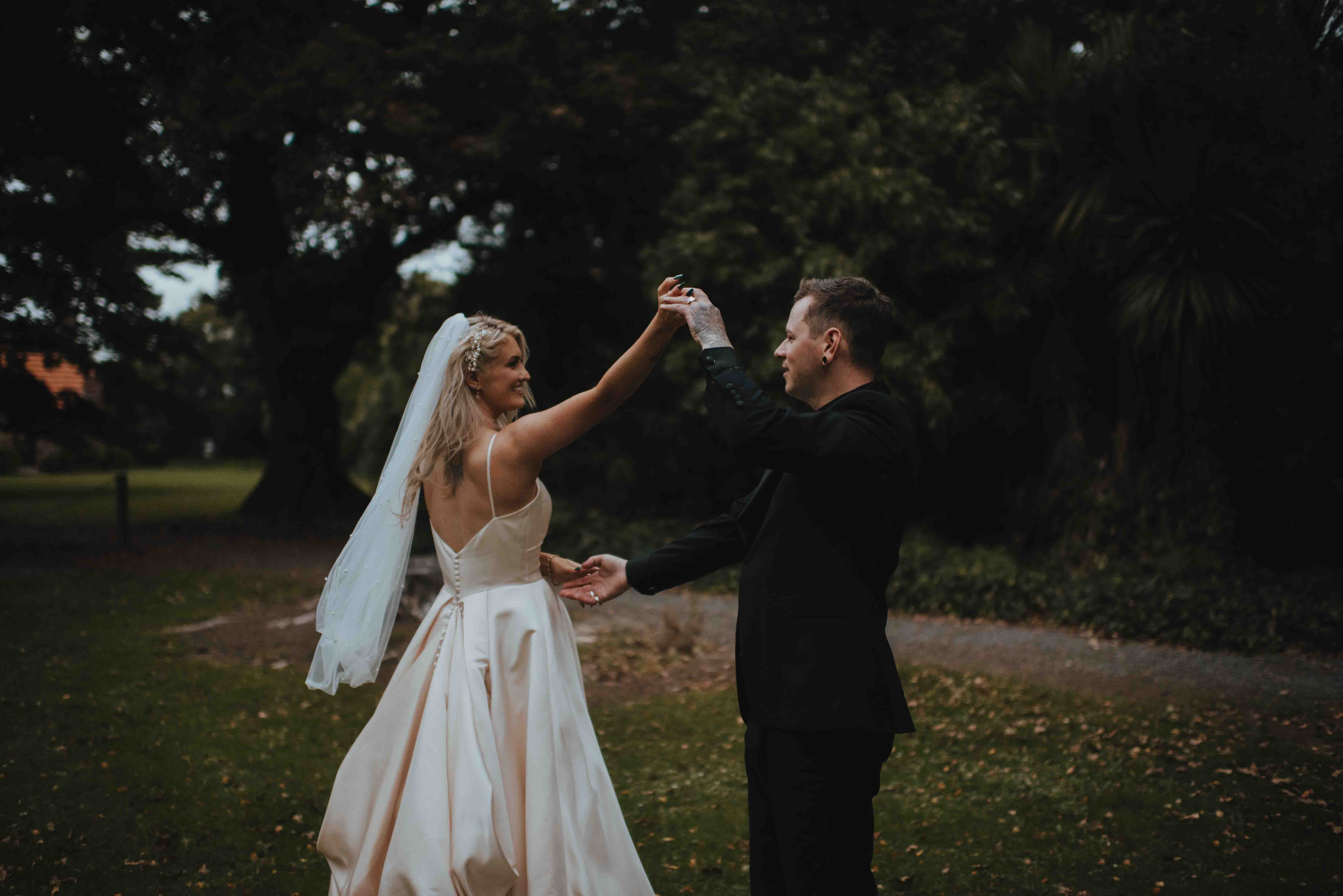 newlyweds dancing in the sunset