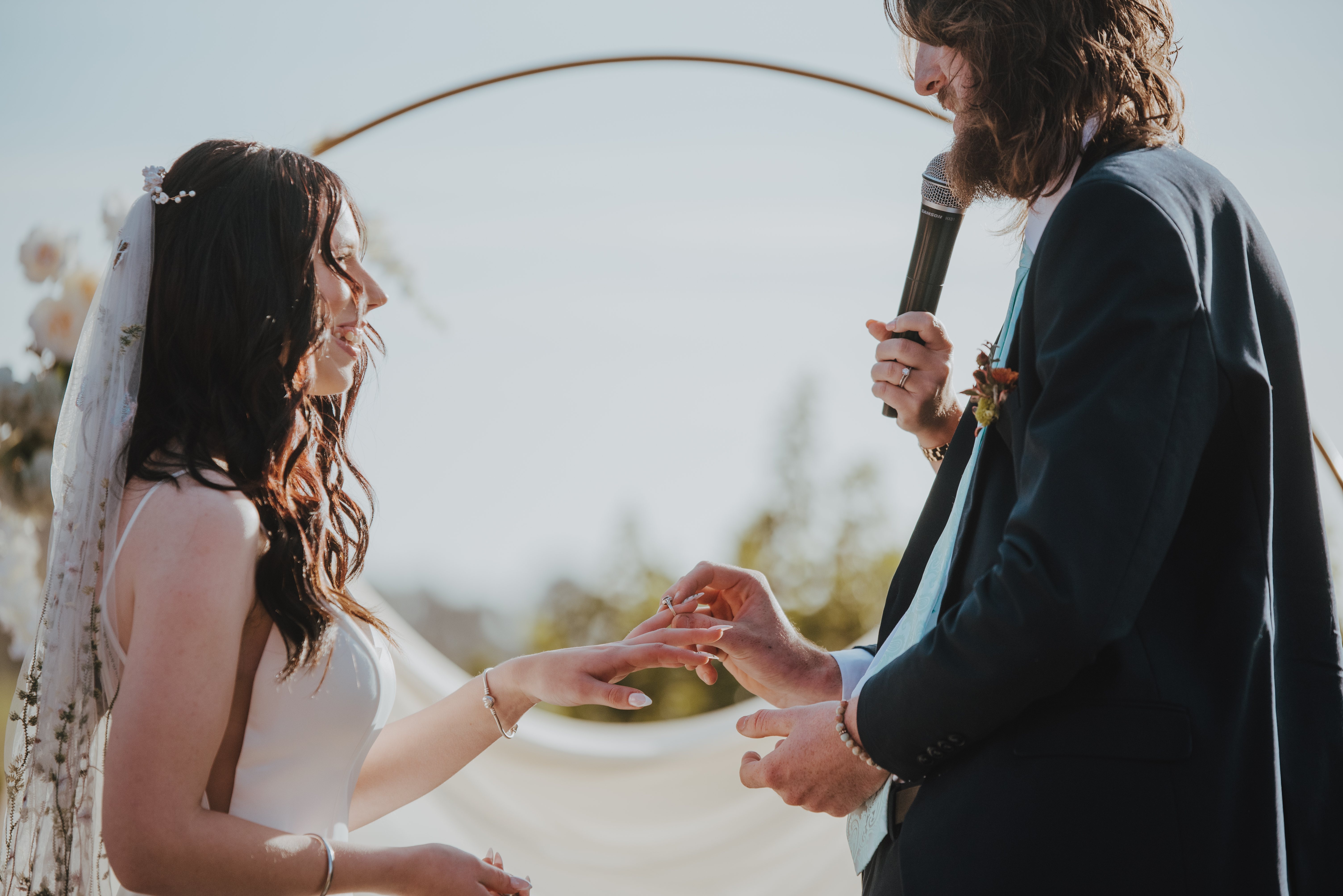 rings being exchanged during ceremony