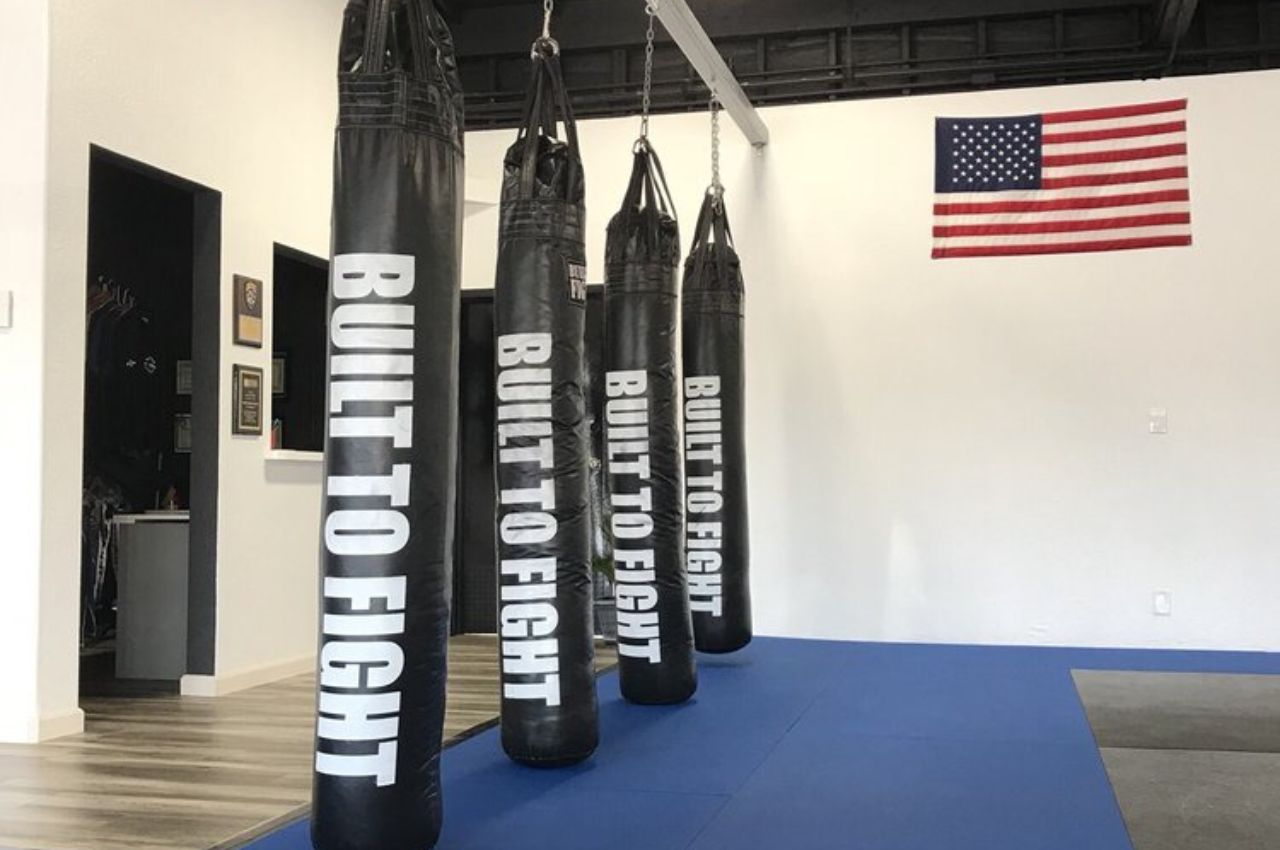 Martial arts instructor with kids